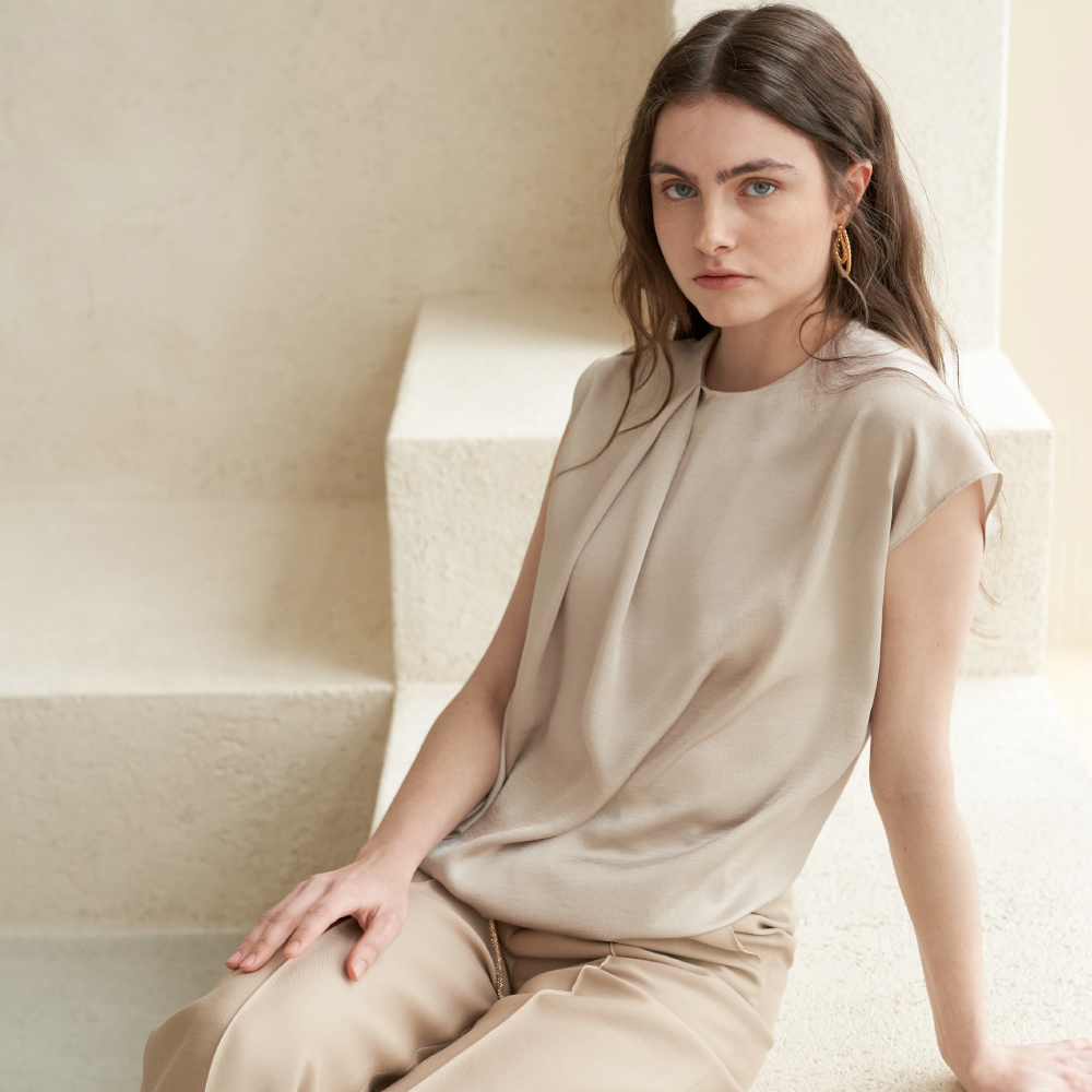 Stylish tuck-detail blouse in Dutch White for luxury women clothing. Shop now!