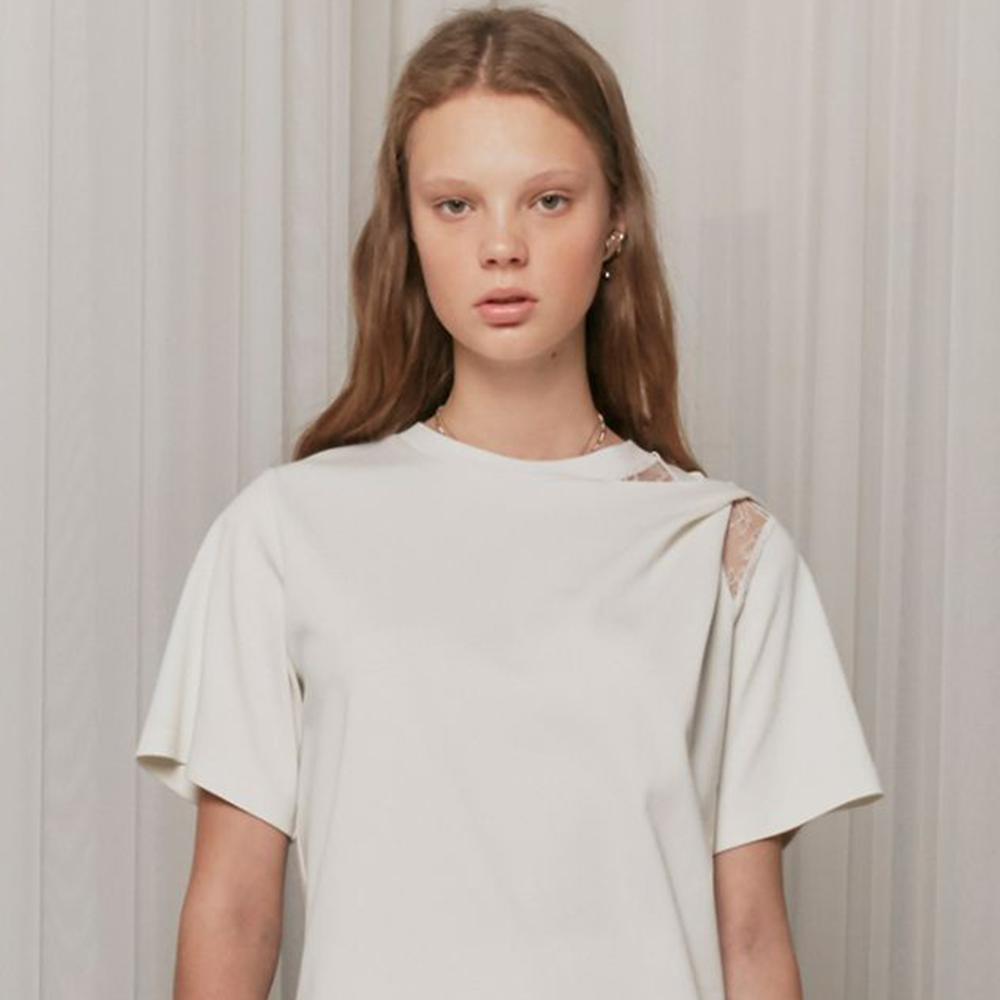 Raw-edged, Round neckline One side handkerchief-hem with patch pocket Adjustable tie belt at waist Relaxed silhouette.