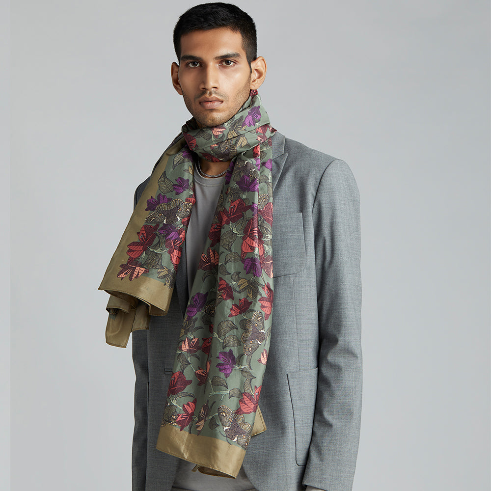 Under the Bougainvillae is a pink and khakhi green stole with unique floral styling that works perfectly with casuals.