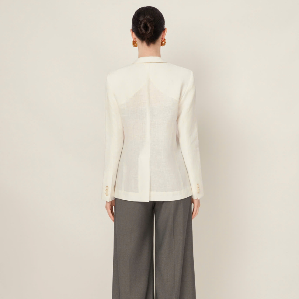 Discover Velora wool pants in luxury women's clothing. Shop Now!