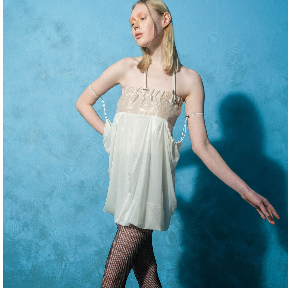 Stylish designer clothes in White Radiancy Skirt design. Shop Now!