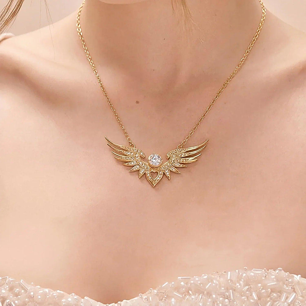 Discover the Winged Heart Eternal Edition Necklace at The Luxe Maison, crafted in solid 14K gold and adorned with lab-grown diamonds, symbolizing love and freedom.