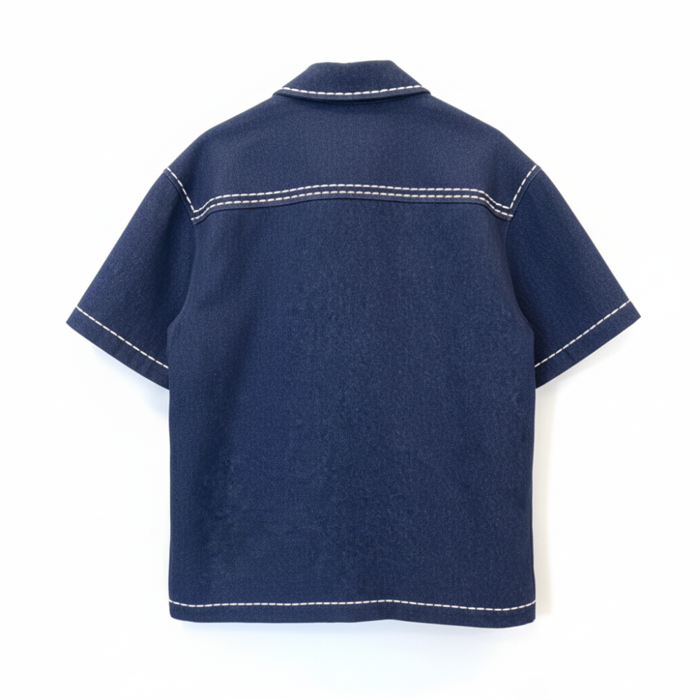 Fun, playful recycled denim shirt in vibrant blue. Designed to turn heads and spark joy. Shop premium styles online.
