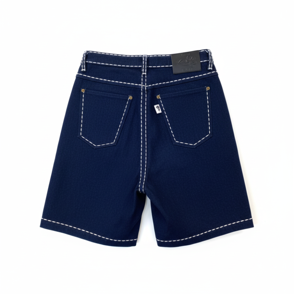 High-waisted sustainable denim shorts with contrast stitching. Your perfect summer staple. Shop premium styles online.