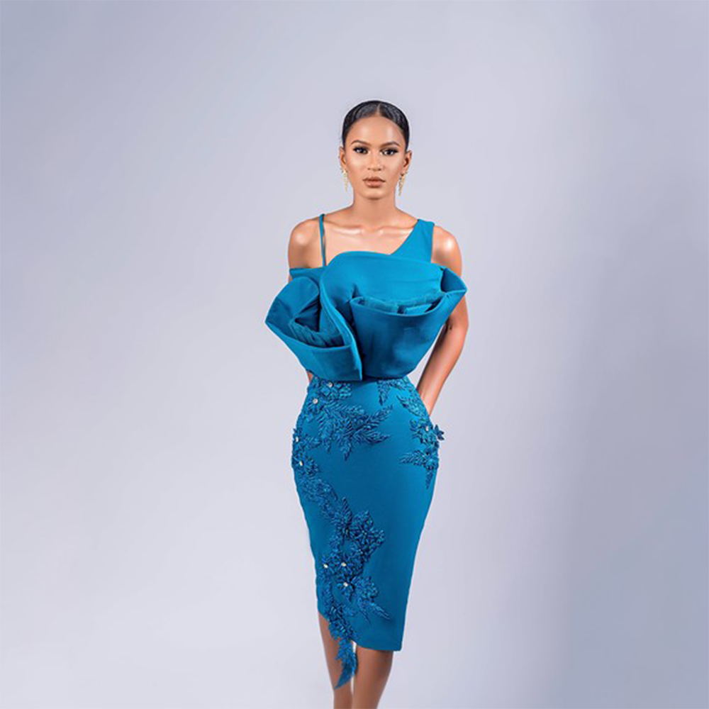 The Alanna dress is made from a slightly stretchy crepe fabric, nicely embellished to bring on the sparkles.