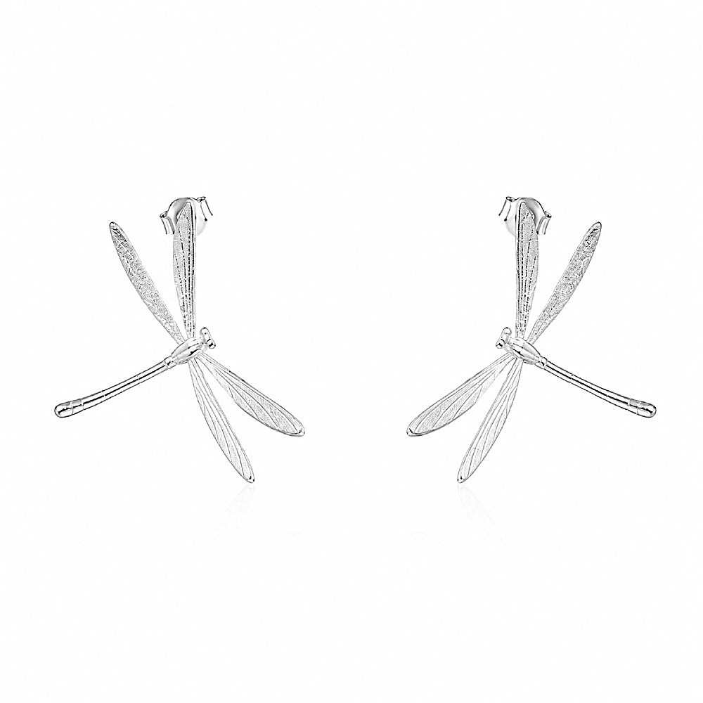 Discover the Dragonfly Whisper Silver Earrings at The Luxe Maison, featuring delicate wing-inspired lines and a graceful, minimalist design that captures the beauty of a dragonfly in flight. Perfect for adding a subtle, nature-inspired elegance to everyday outfits and special occasions.