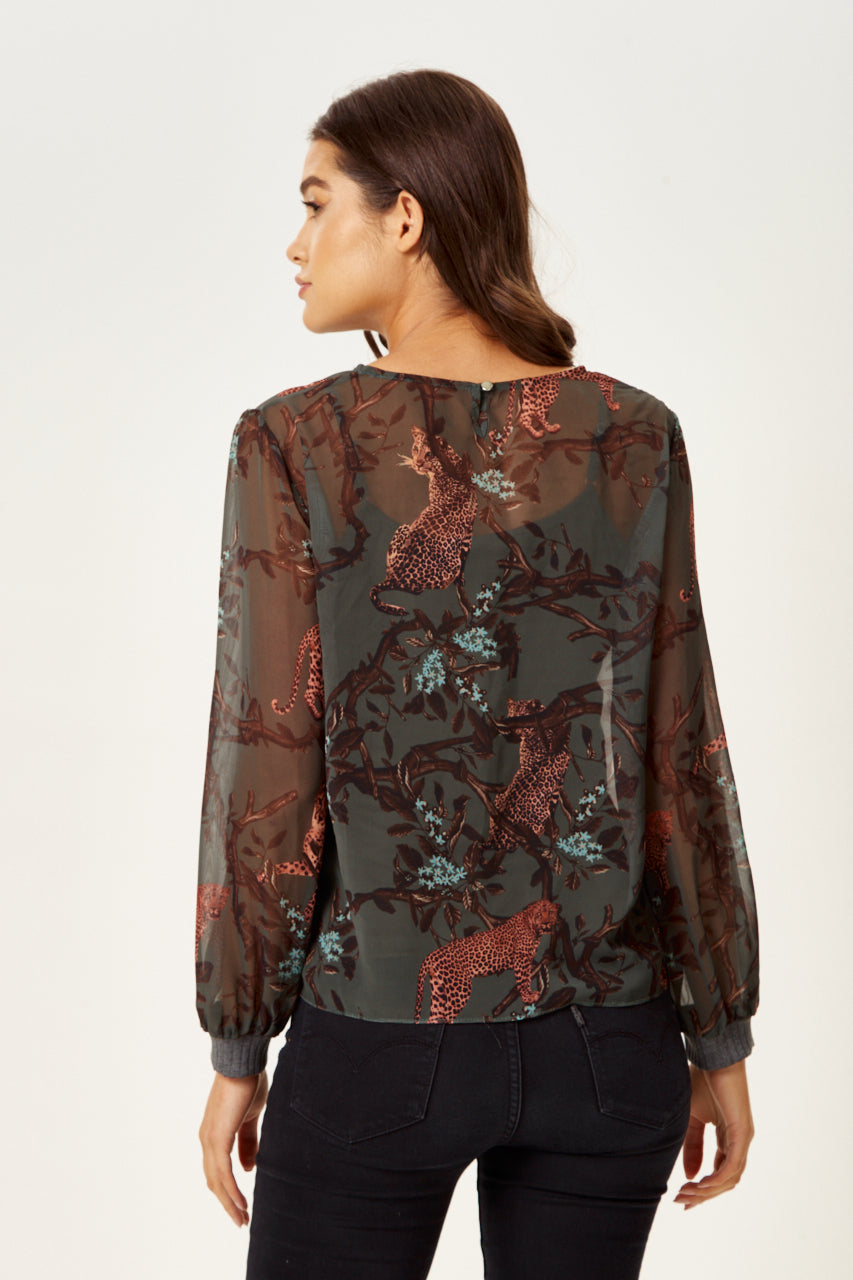 Explore women clothing stores online featuring the Women's Long Sleeve Khaki Leopard Print Top. Shop Now!