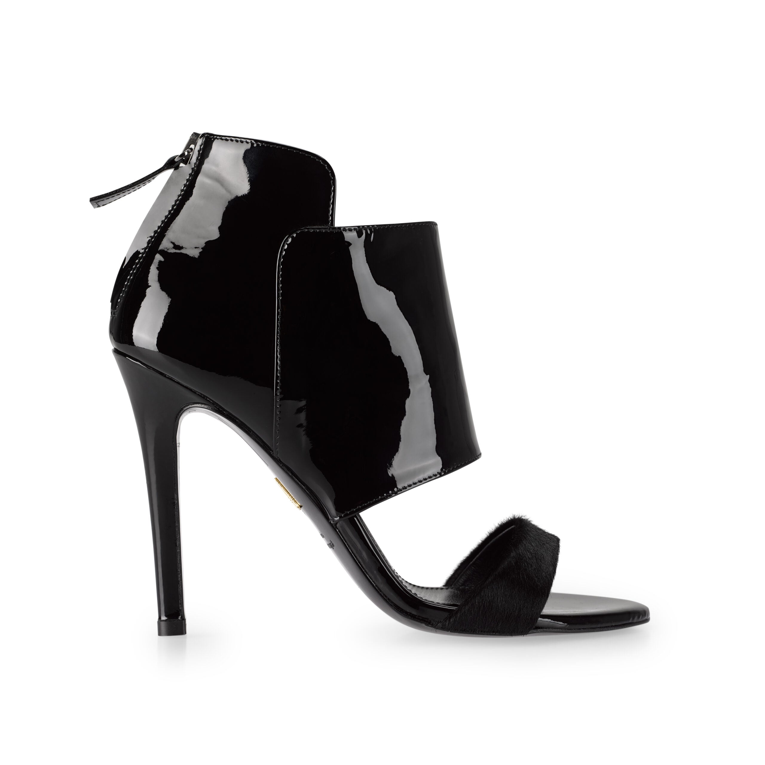Handcrafted in portugal from black patent leather, the pair sits on a classic stiletto heel.