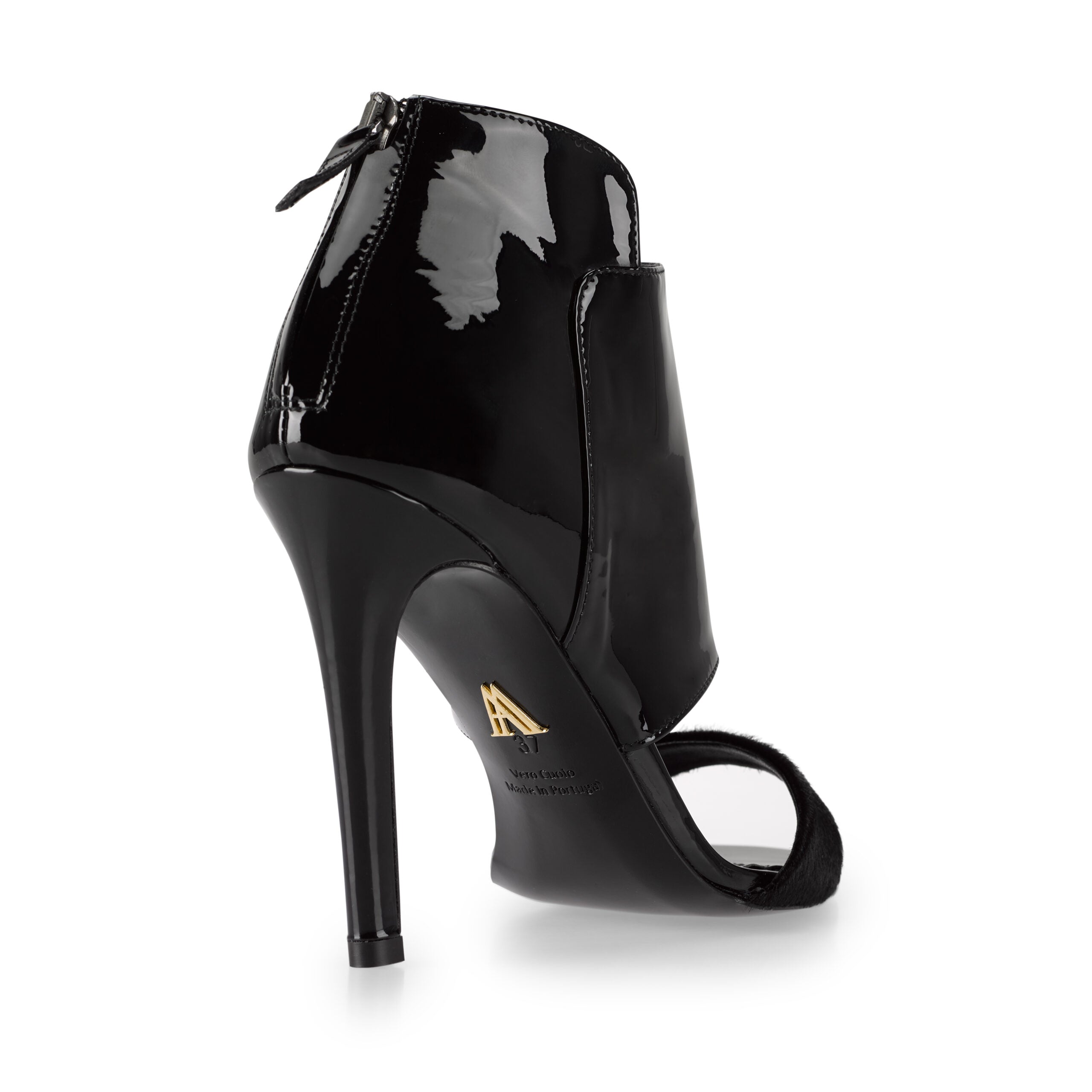 Handcrafted in portugal from black patent leather, the pair sits on a classic stiletto heel.