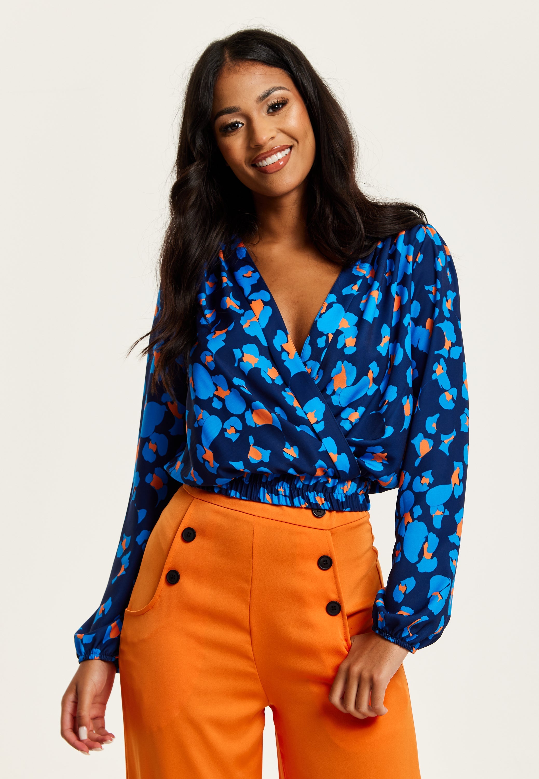 Women's Abstract Print Wrap Top In Pink, Orange, And Blue - Crossover Front, V Neck, Long Sleeves, Elasticated Waist