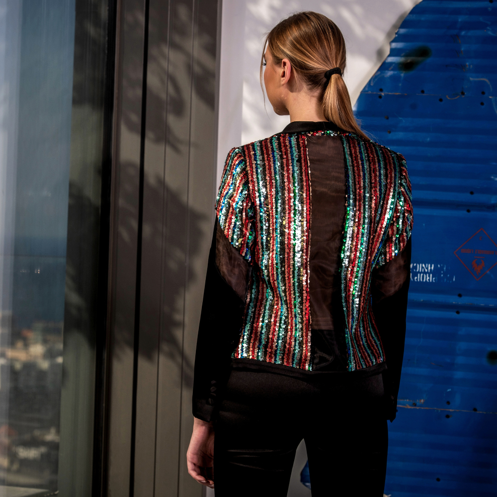 Black crepe Blazer in multi-colored sequins and black pants.