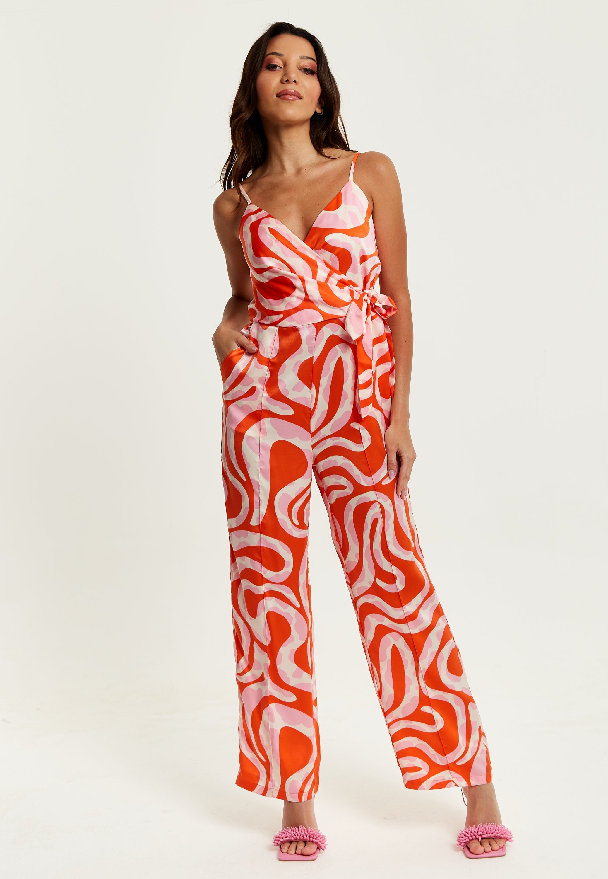 Women's Jumpsuit in Pink and Red Abstract Print with V Neck, Crossover Front, Tie Waist, Wide Legs - Liquorish