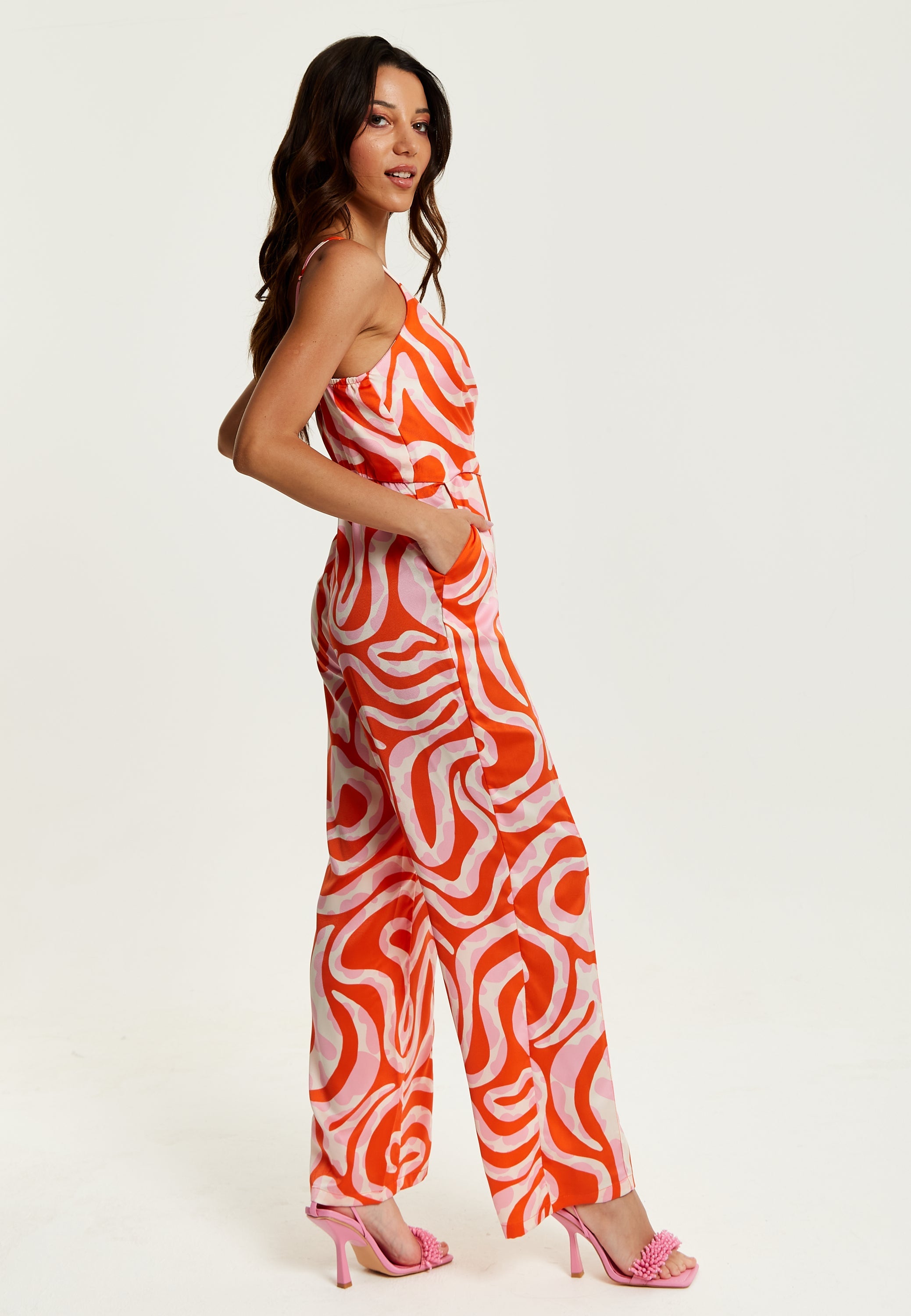 Women's Jumpsuit in Pink and Red Abstract Print with V Neck, Crossover Front, Tie Waist, Wide Legs - Liquorish