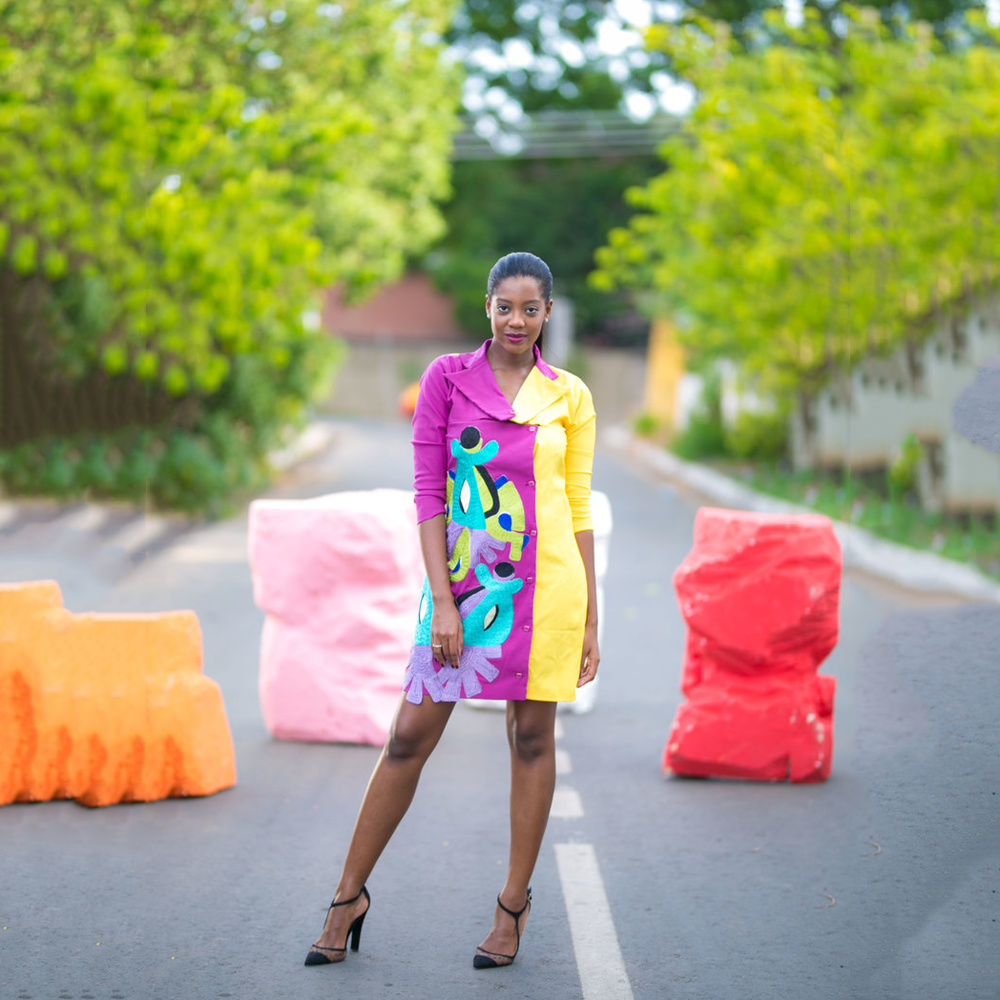 Bold 2-toned blazer dress: Purple meets yellow in a chic fusion. Make a statement with vibrant elegance.