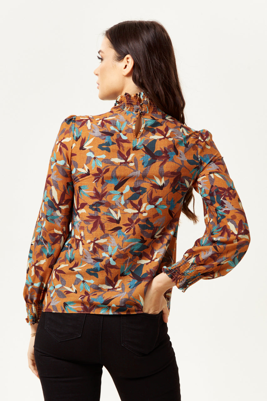 Explore womens wear featuring the elegant Divine Grace Long Sleeve Floral Print Top. Shop Now!