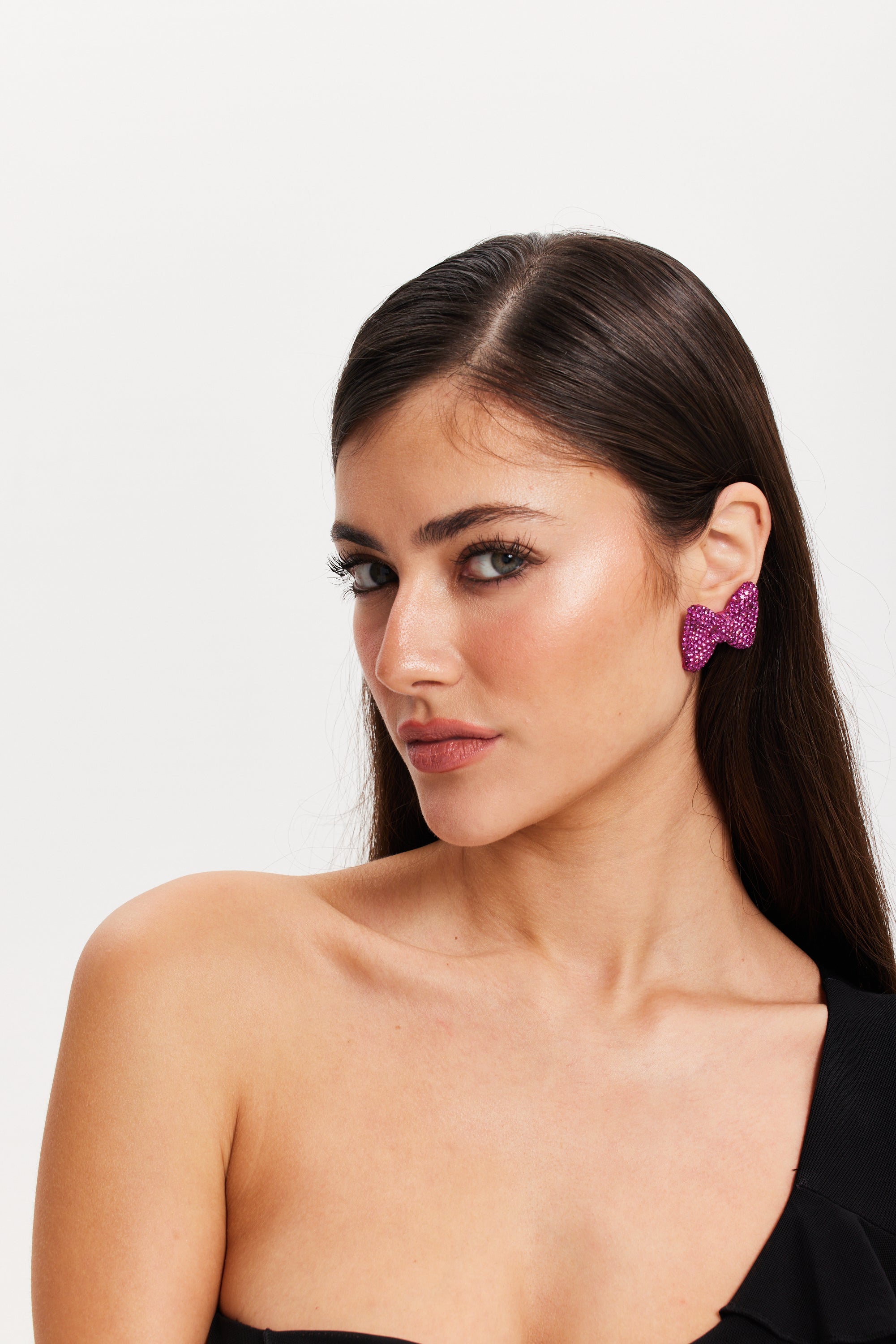 Liquorish Diamonte Bow Stud Earrings In Pink