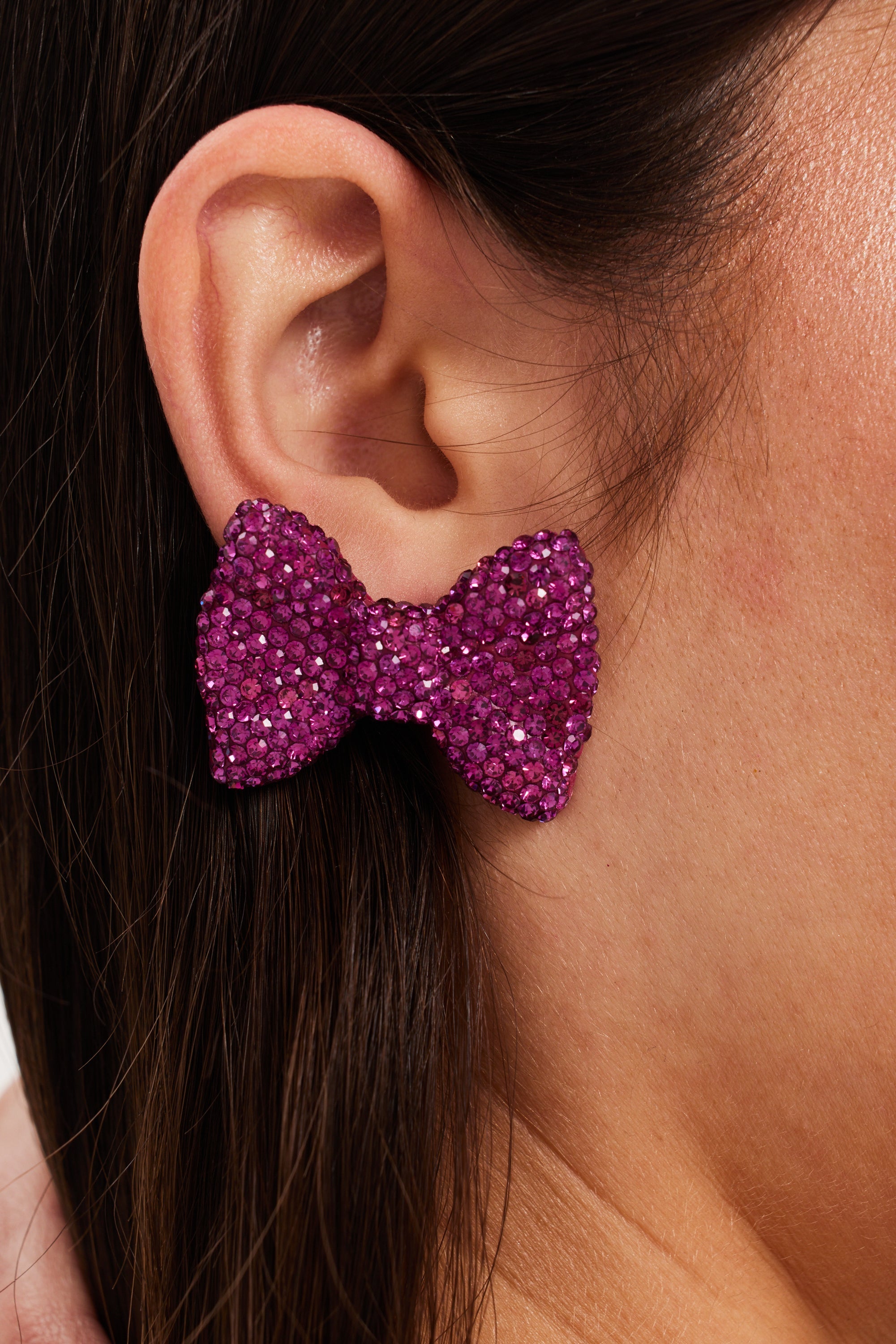 Liquorish Diamonte Bow Stud Earrings In Pink