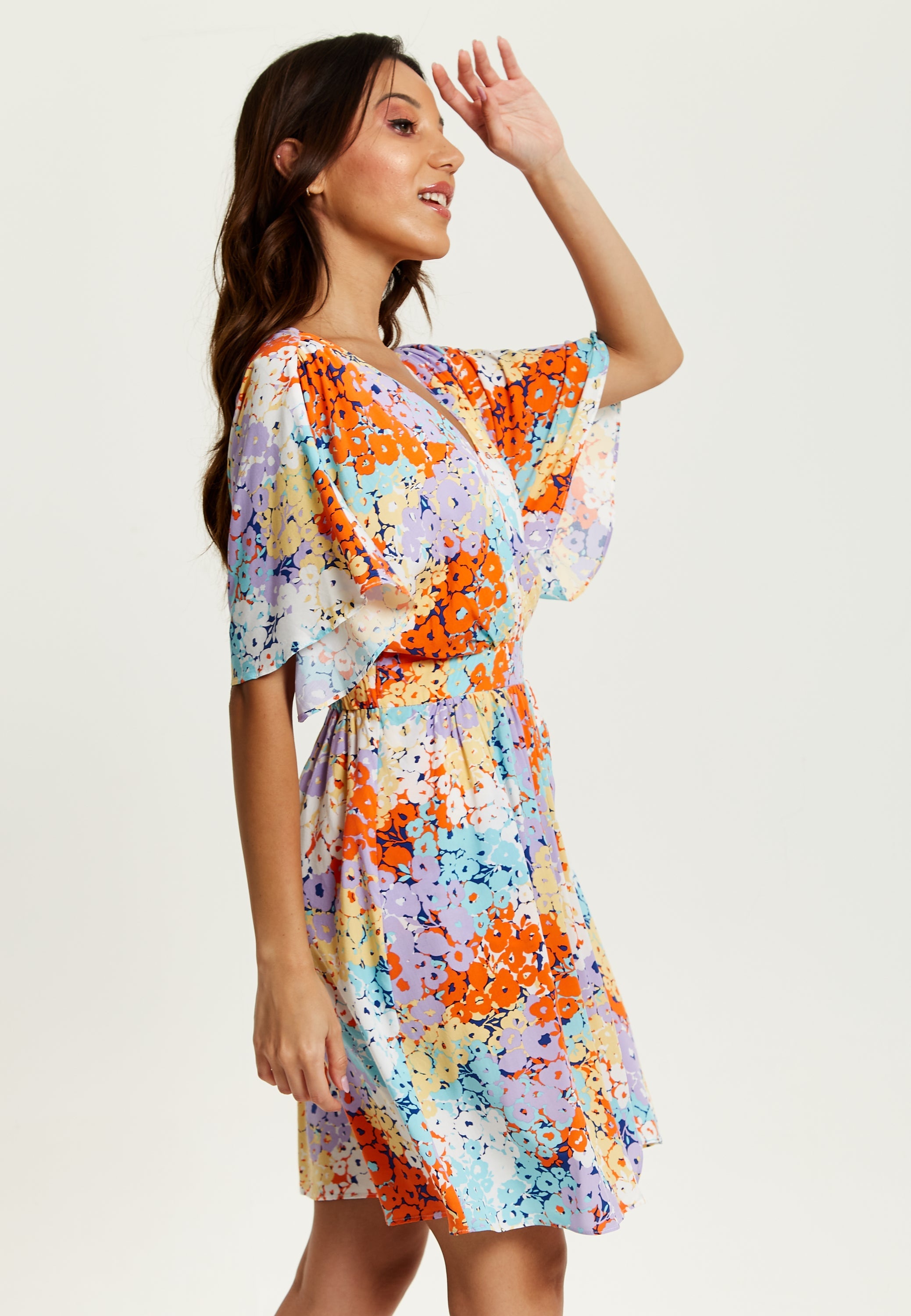 Women's Mini Dress with Open Back and Elasticated Waist in Multicolour Floral Print - Liquorish