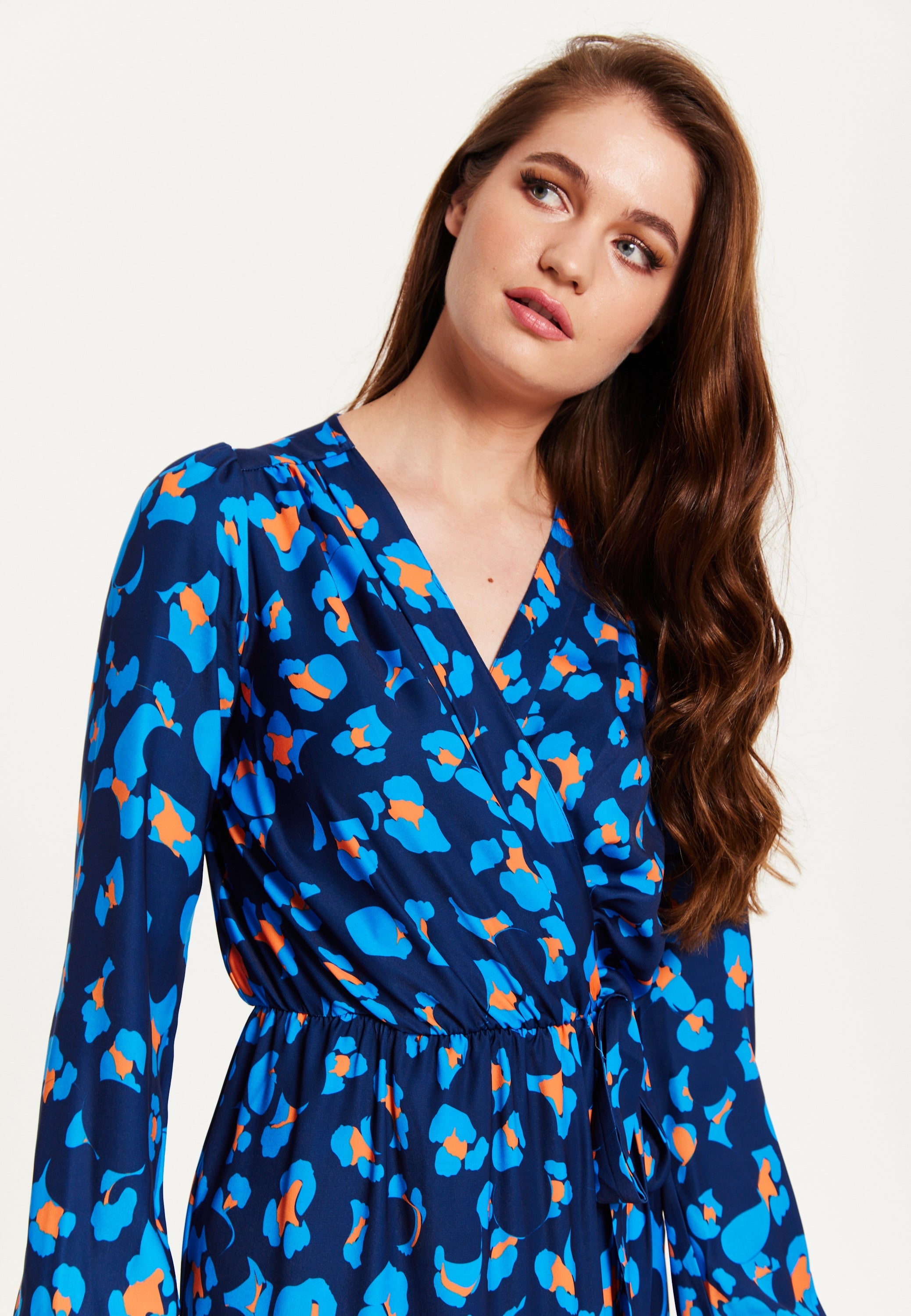 Women's Midi Wrap Dress in Blue with Long Sleeves - Elegant Abstract Print Design by Liquorish