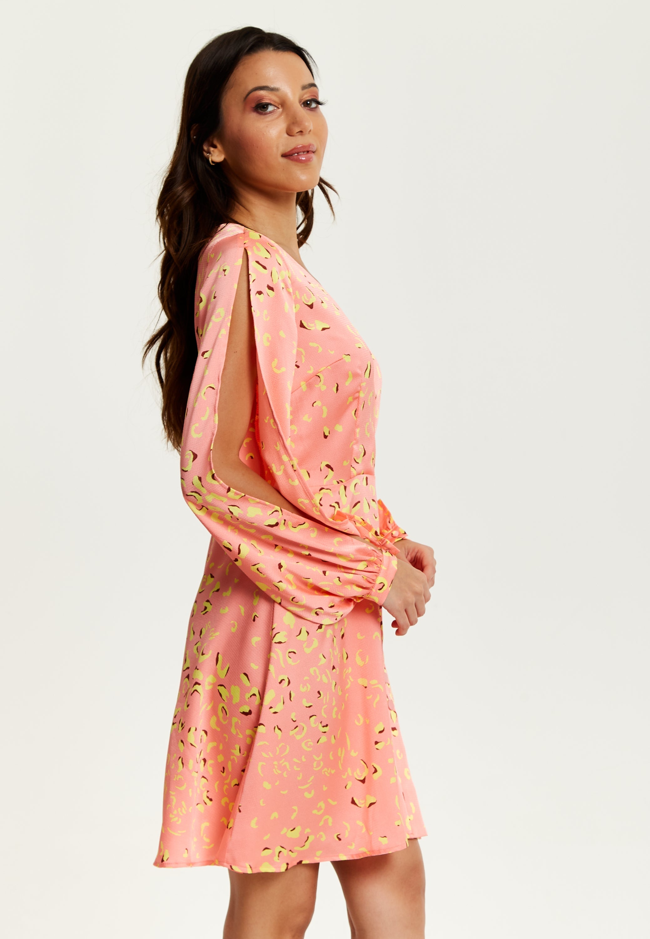 Women's Mini Dress in Peach with Slit Sleeves and Abstract Animal Print - Effortless Style by Liquorish