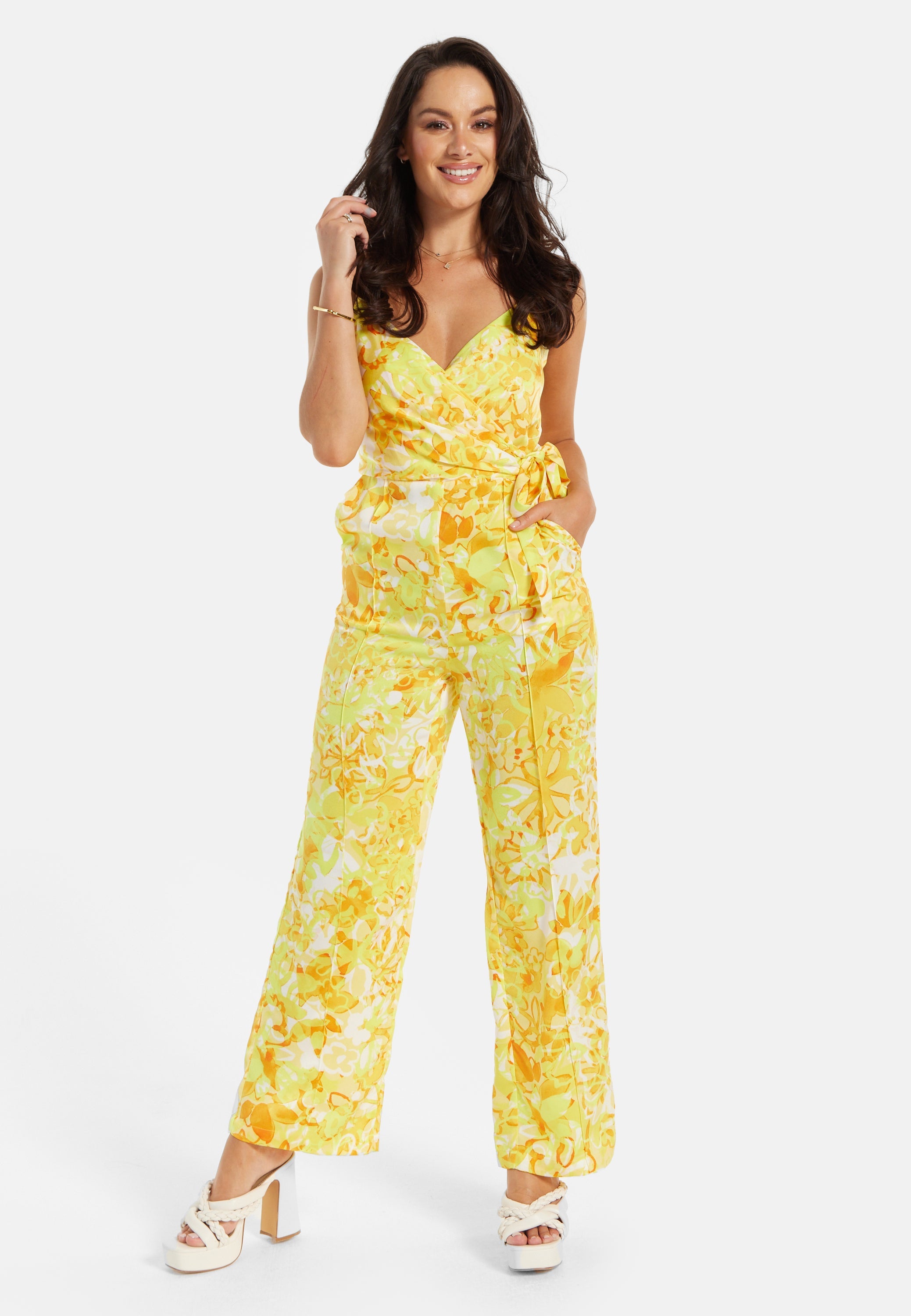 Women's Jumpsuit in Yellow and Orange Floral Print with V-Neck, Adjustable Straps, and Tie Waist - Liquorish