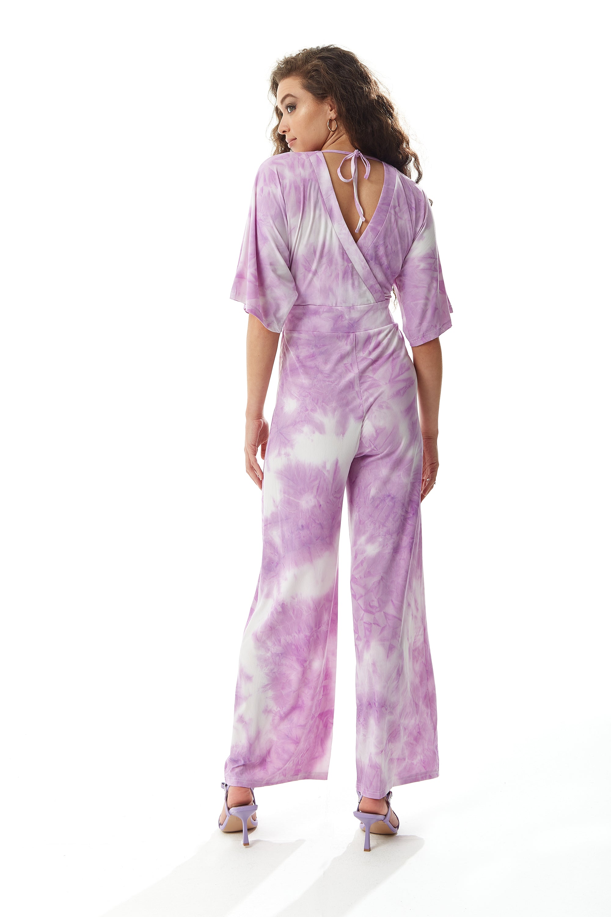 Shop luxury clothing online and discover the chic White & Pink Tie Dye Women's Jumpsuit. Shop Now!