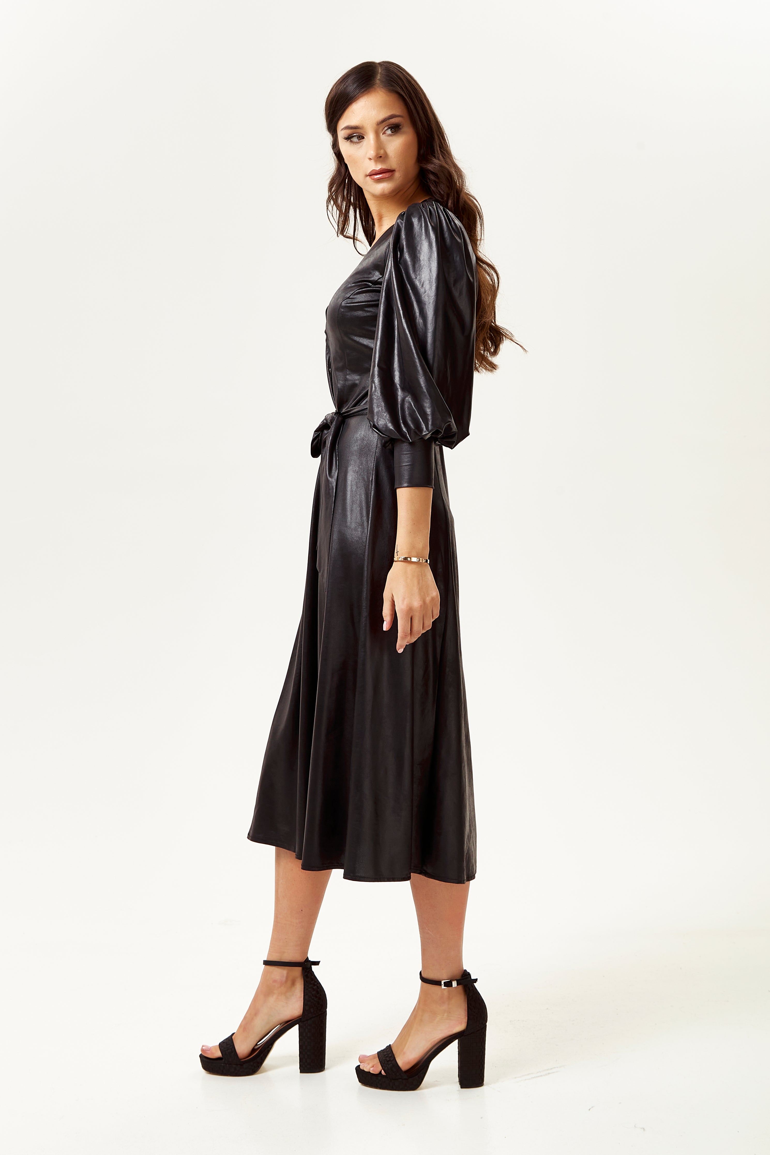 Explore designer dresses for women with the elegant Women's Midi Dress in Black. Shop Now!