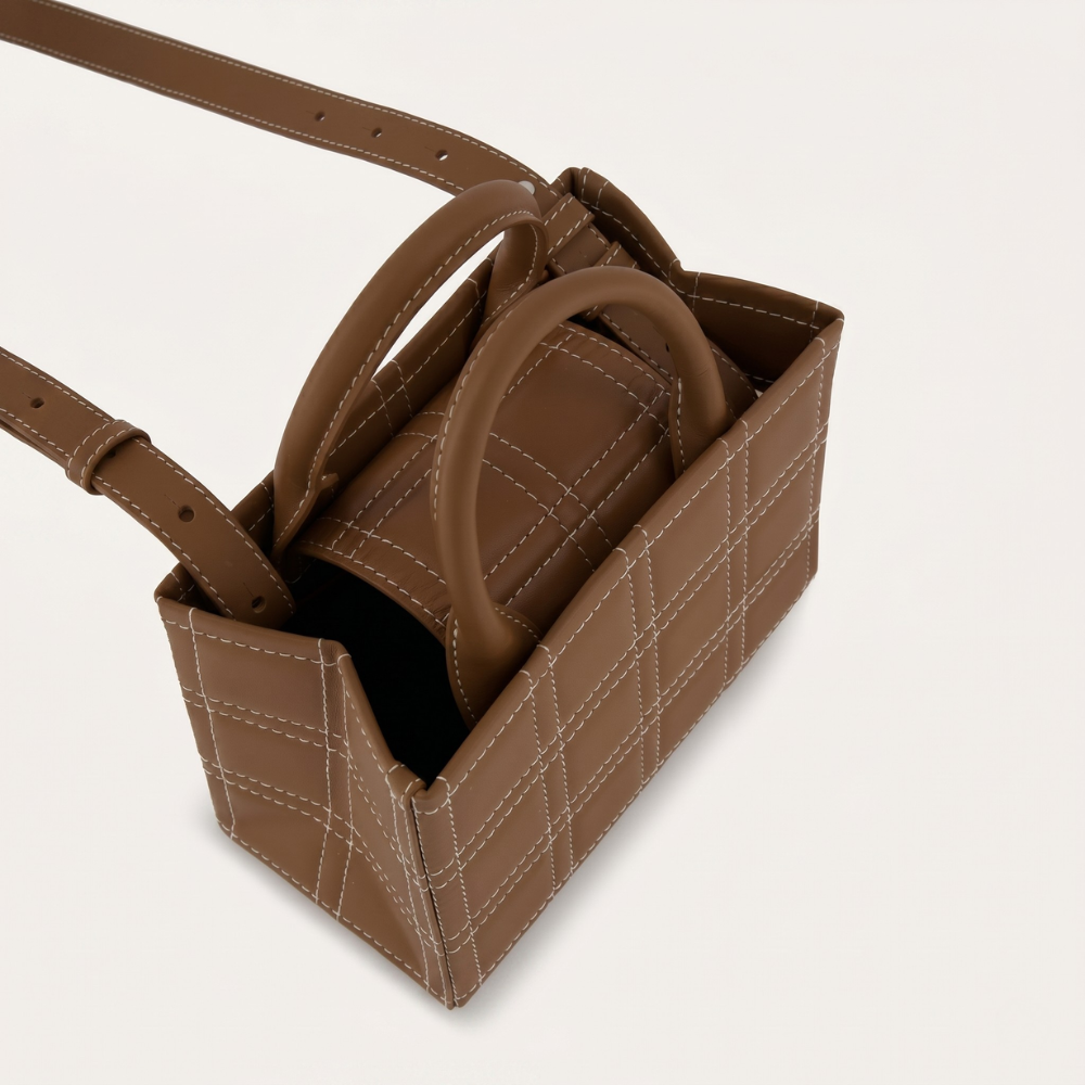 Leather bag with adjustable strap and flap closure, pre order item. Shop online from our curated edit of premium fashion.
