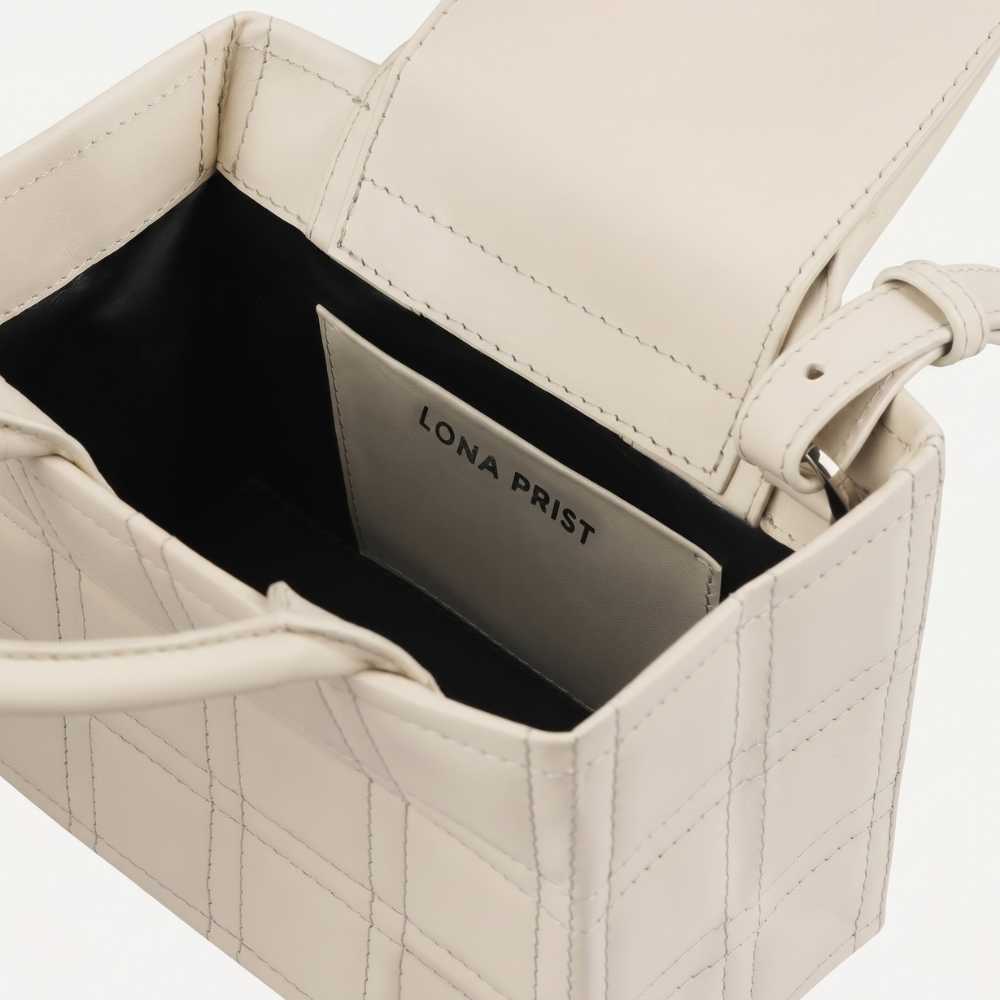 Leather bag with adjustable strap and flap closure, pre order item. Shop online from our curated edit of premium fashion.