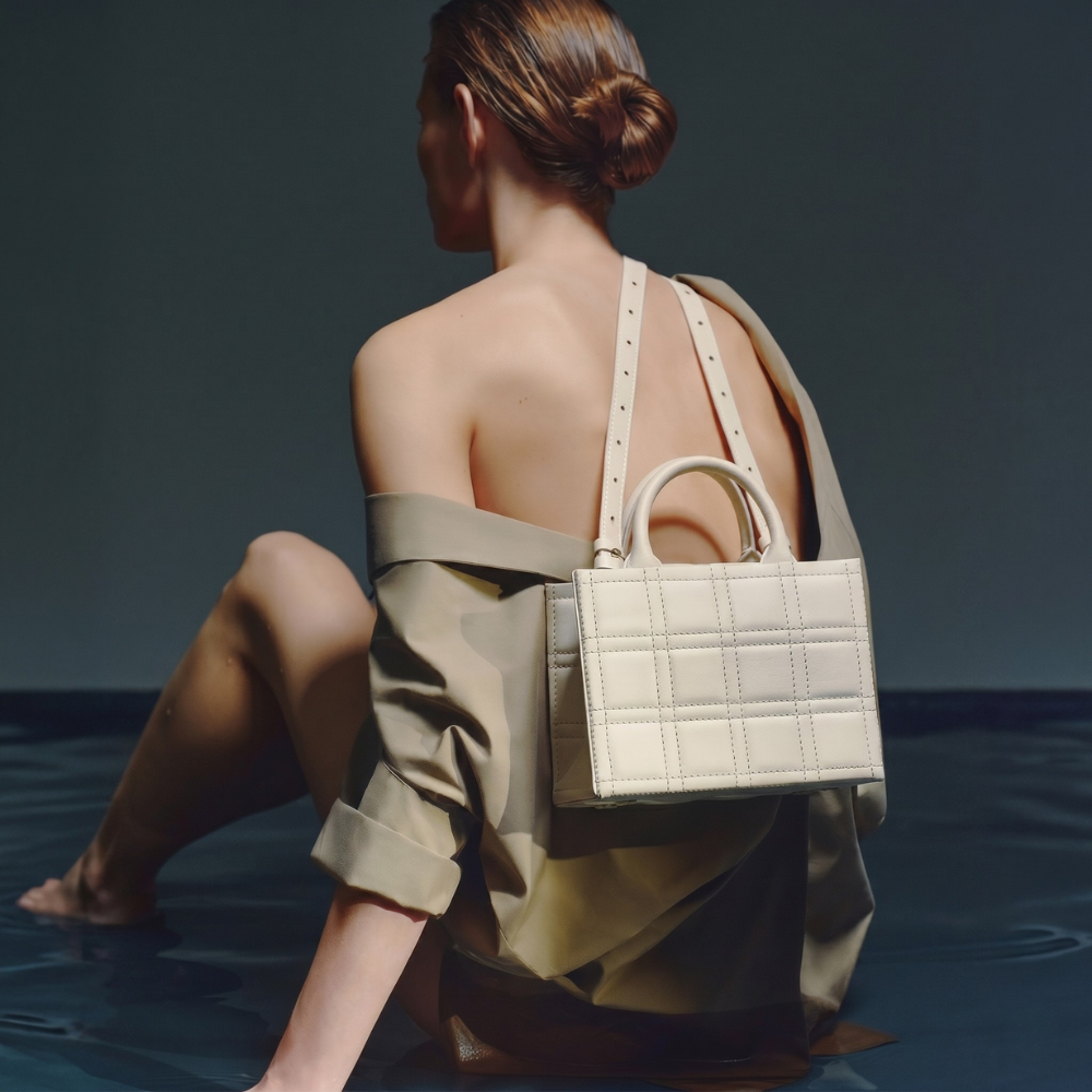Leather bag with adjustable strap and flap closure, pre order item. Shop online from our curated edit of premium fashion.