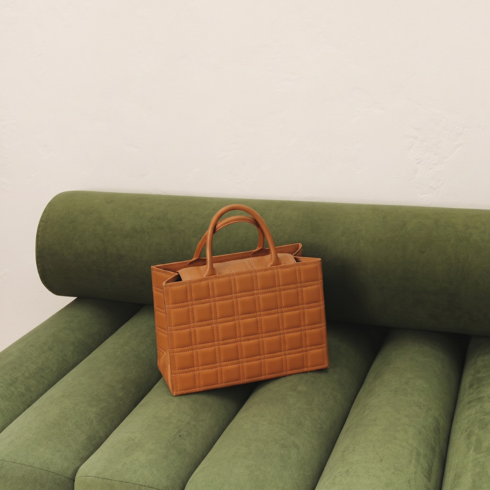Leather tote bag with flap closure and compartments, pre order item. Shop online from our curated edit of premium fashion.