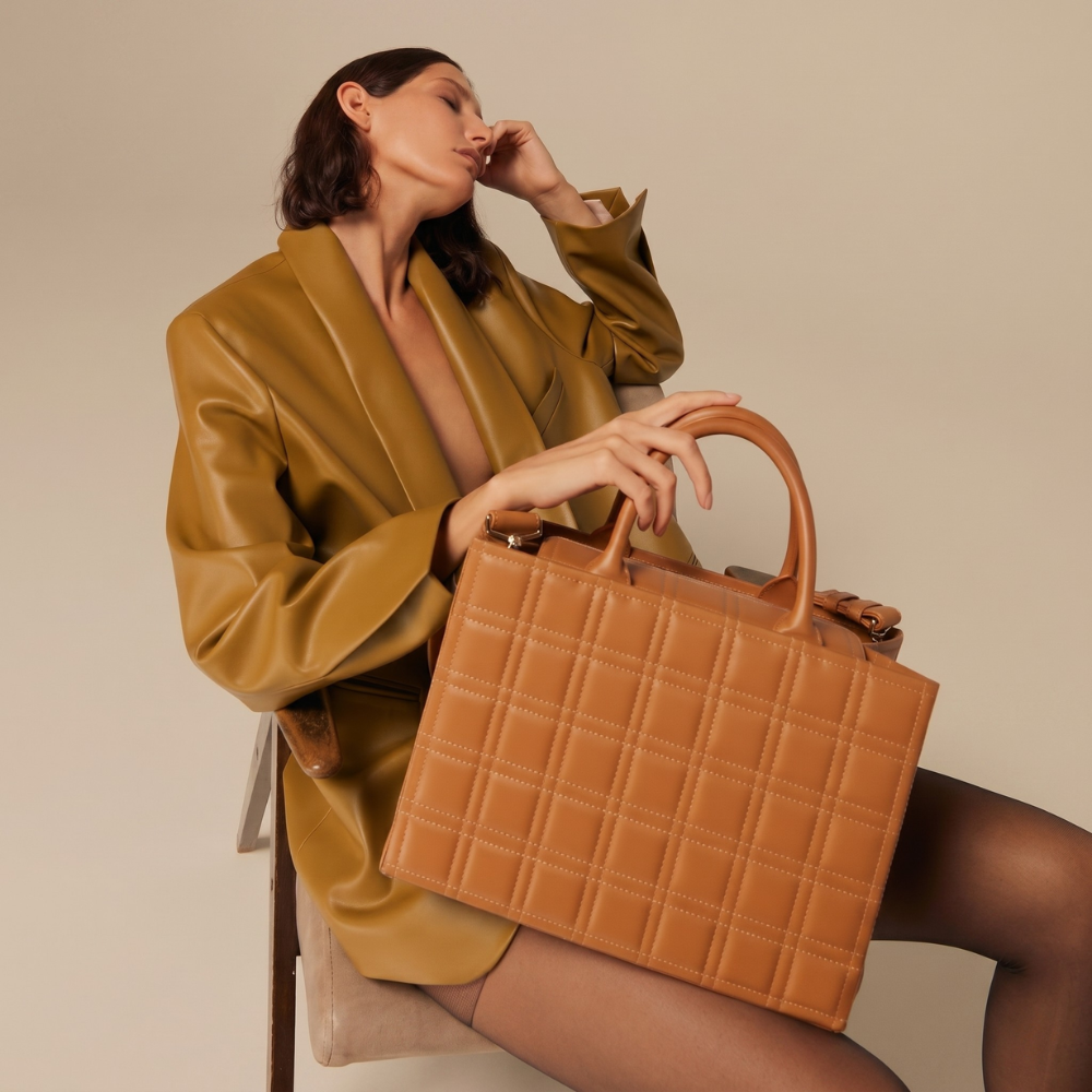 Leather tote bag with flap closure and compartments, pre order item. Shop online from our curated edit of premium fashion.