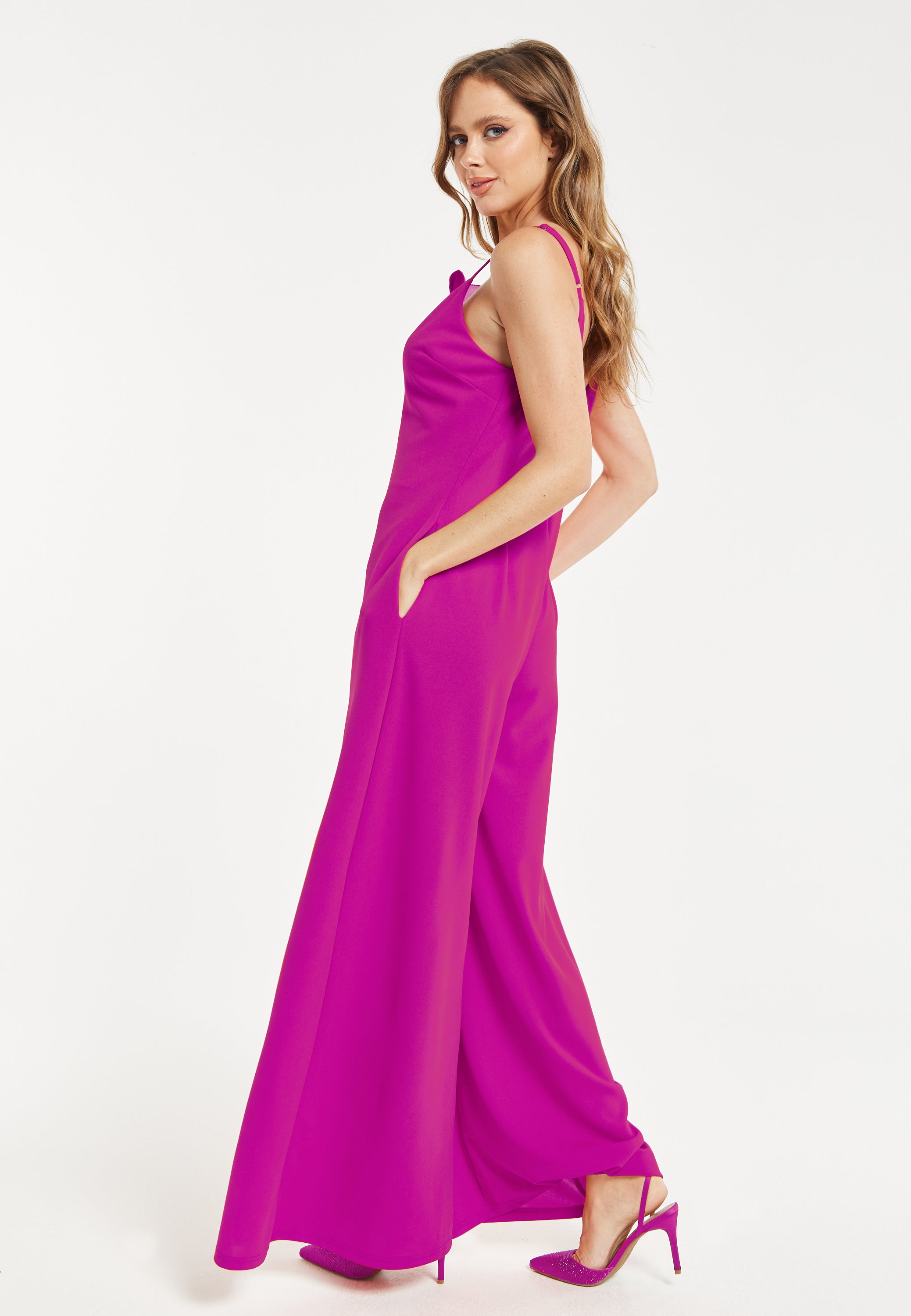 Women's Fuchsia Wide-Leg Jumpsuit with Floral Applique & Deep V-Neck, Side Pockets - Liquorish