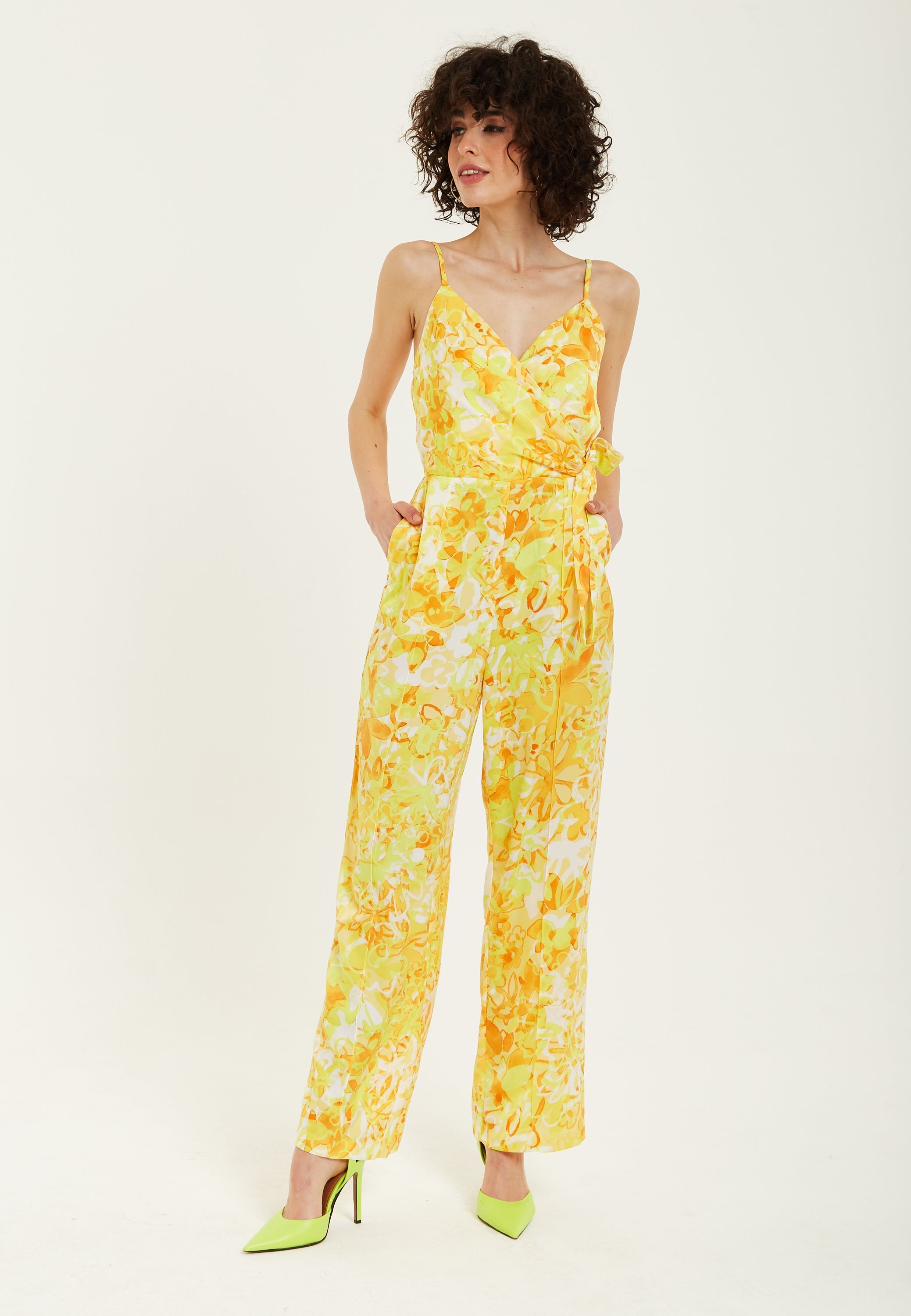 Women's Jumpsuit in Yellow and Orange Floral Print with V-Neck, Adjustable Straps, and Tie Waist - Liquorish