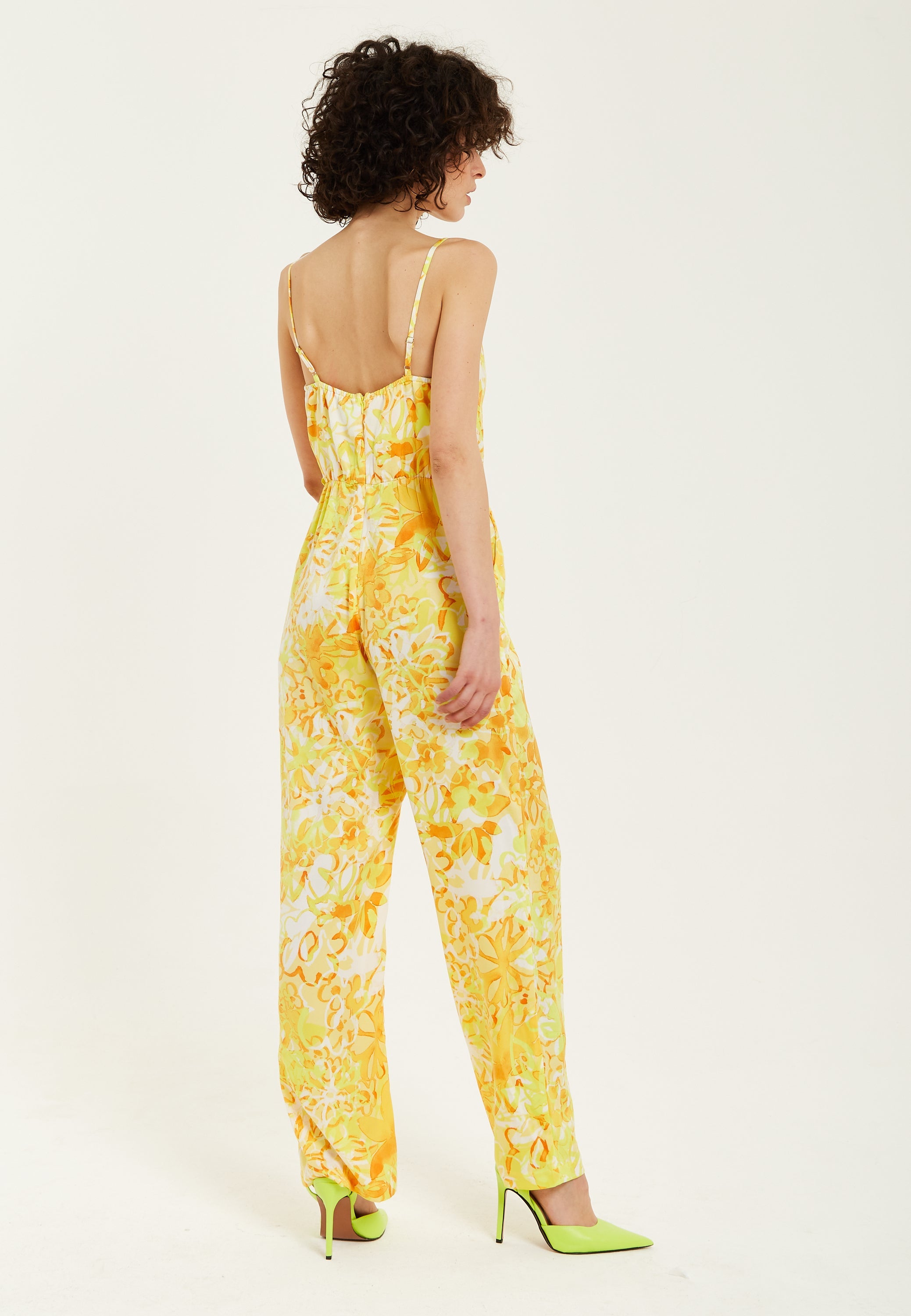 Women's Jumpsuit in Yellow and Orange Floral Print with V-Neck, Adjustable Straps, and Tie Waist - Liquorish