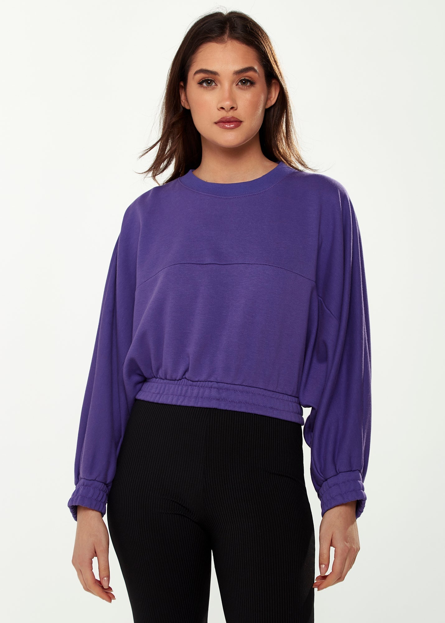 Women's Cropped Sweatshirt in Purple with Unique Bat and Balloon Sleeves, Round Neck, and Elastic Cuffs for a Chic Look