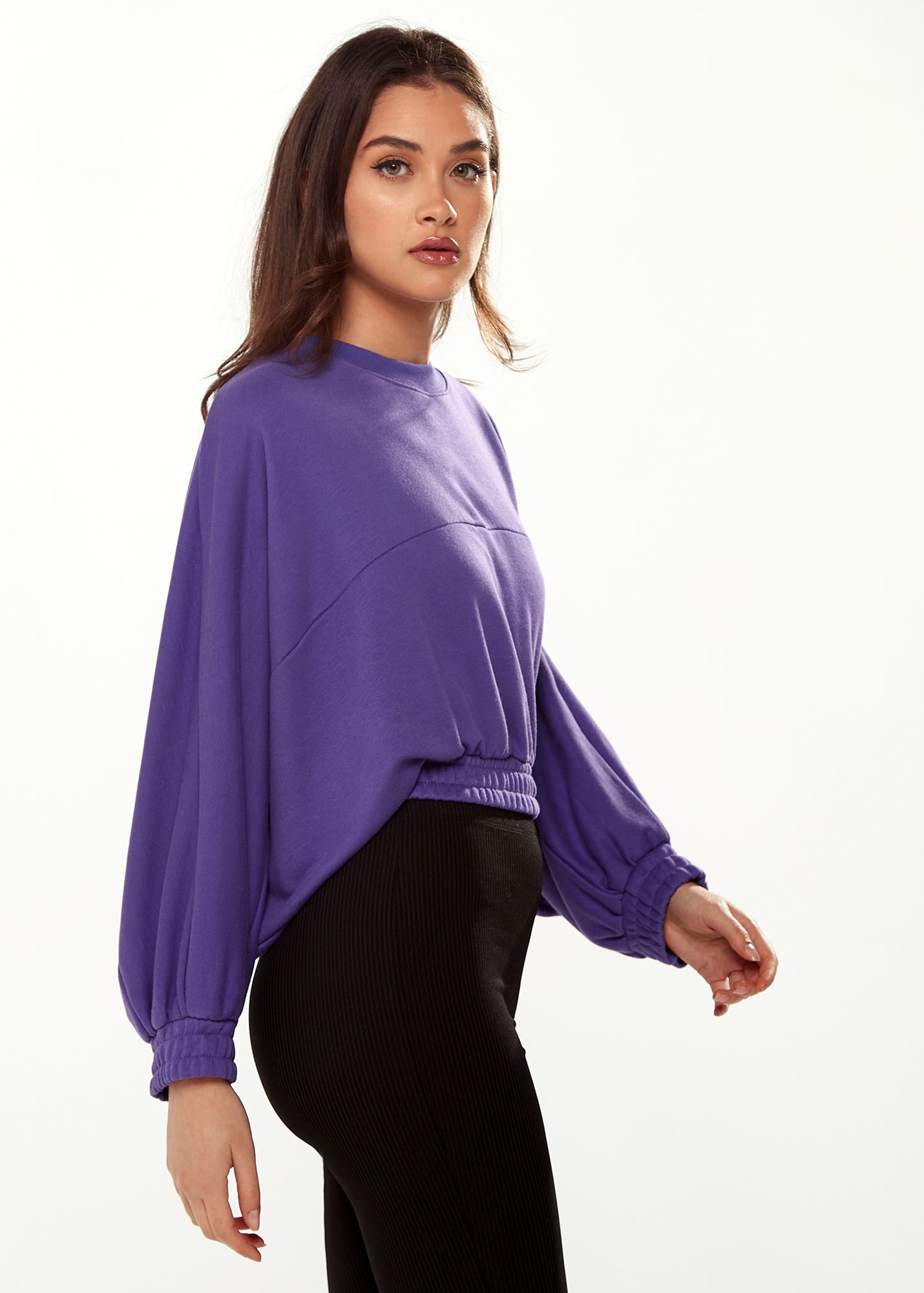 Women's Cropped Sweatshirt in Purple with Unique Bat and Balloon Sleeves, Round Neck, and Elastic Cuffs for a Chic Look
