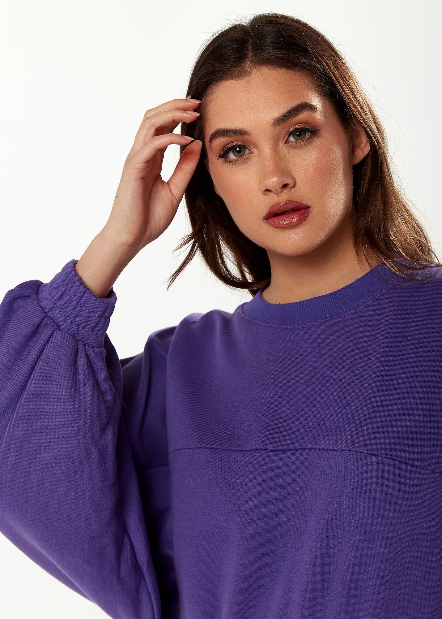 Women's Cropped Sweatshirt in Purple with Unique Bat and Balloon Sleeves, Round Neck, and Elastic Cuffs for a Chic Look