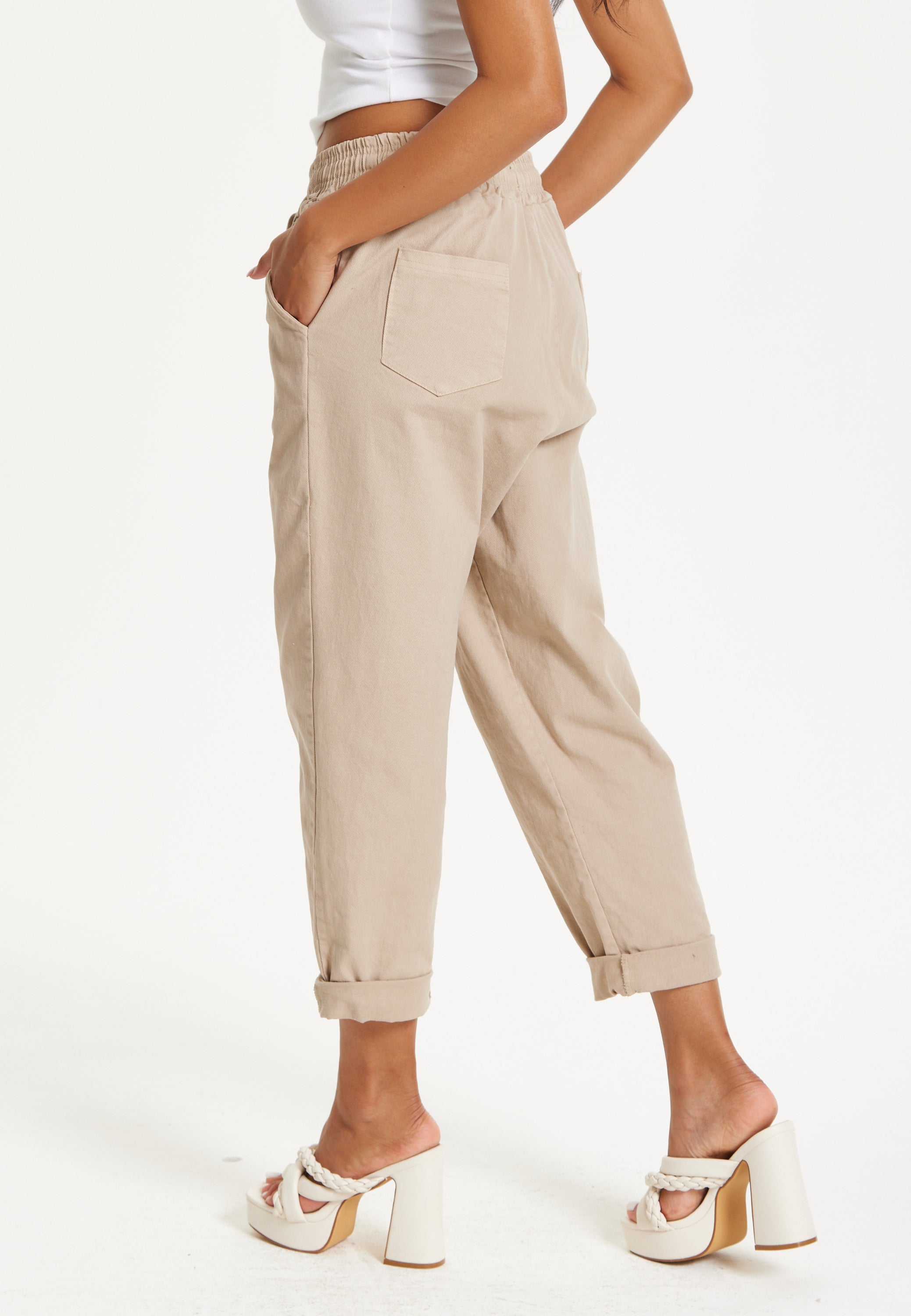 Beige Relaxed Fit Tapered Trousers