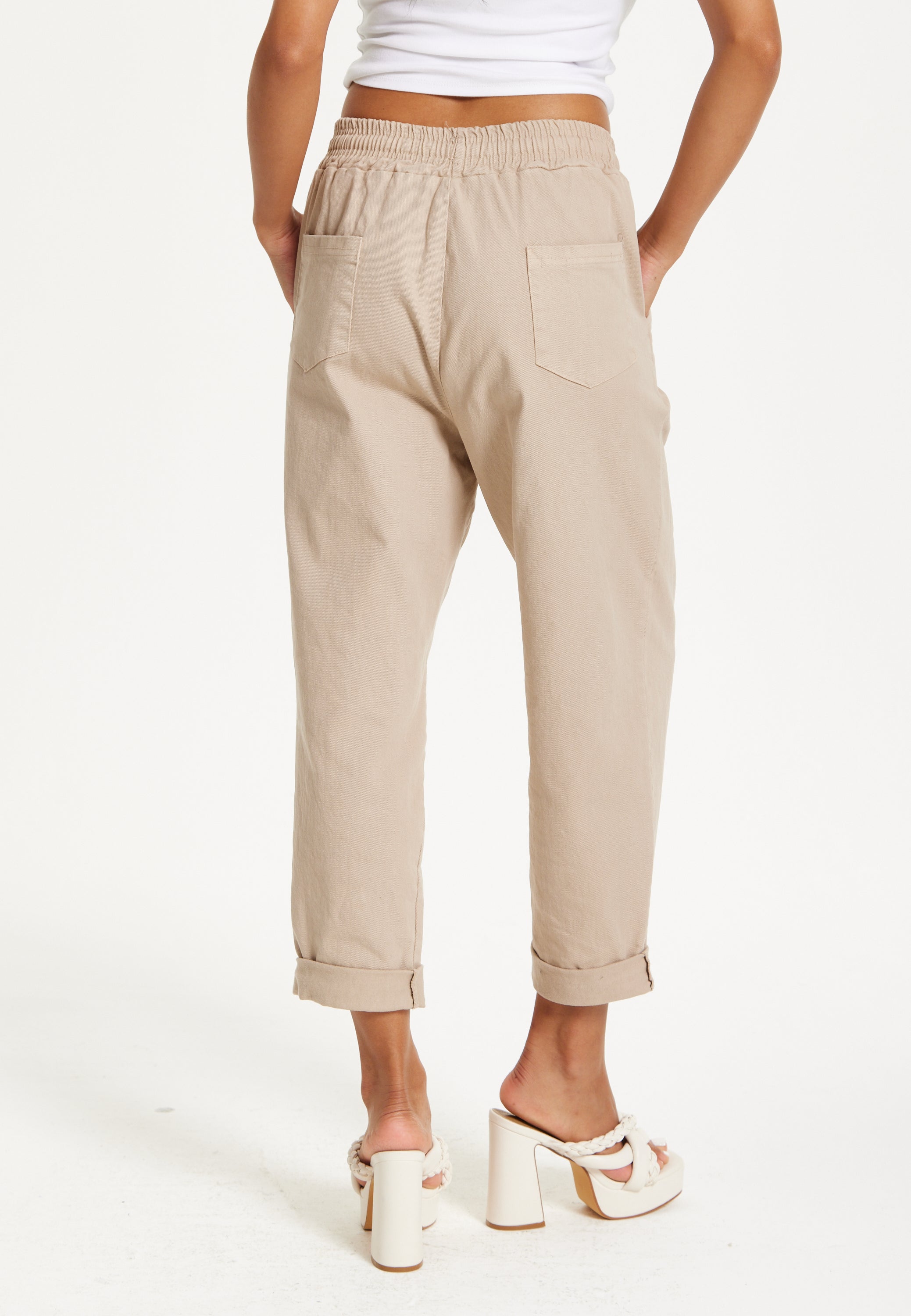 Beige Relaxed Fit Tapered Trousers