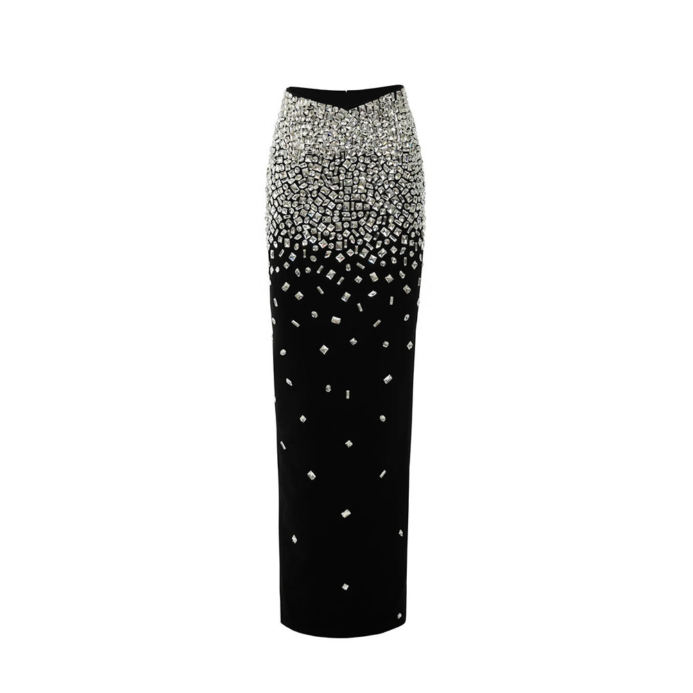 A crystal embroidered cropped top with a black crepe column skirt. 
