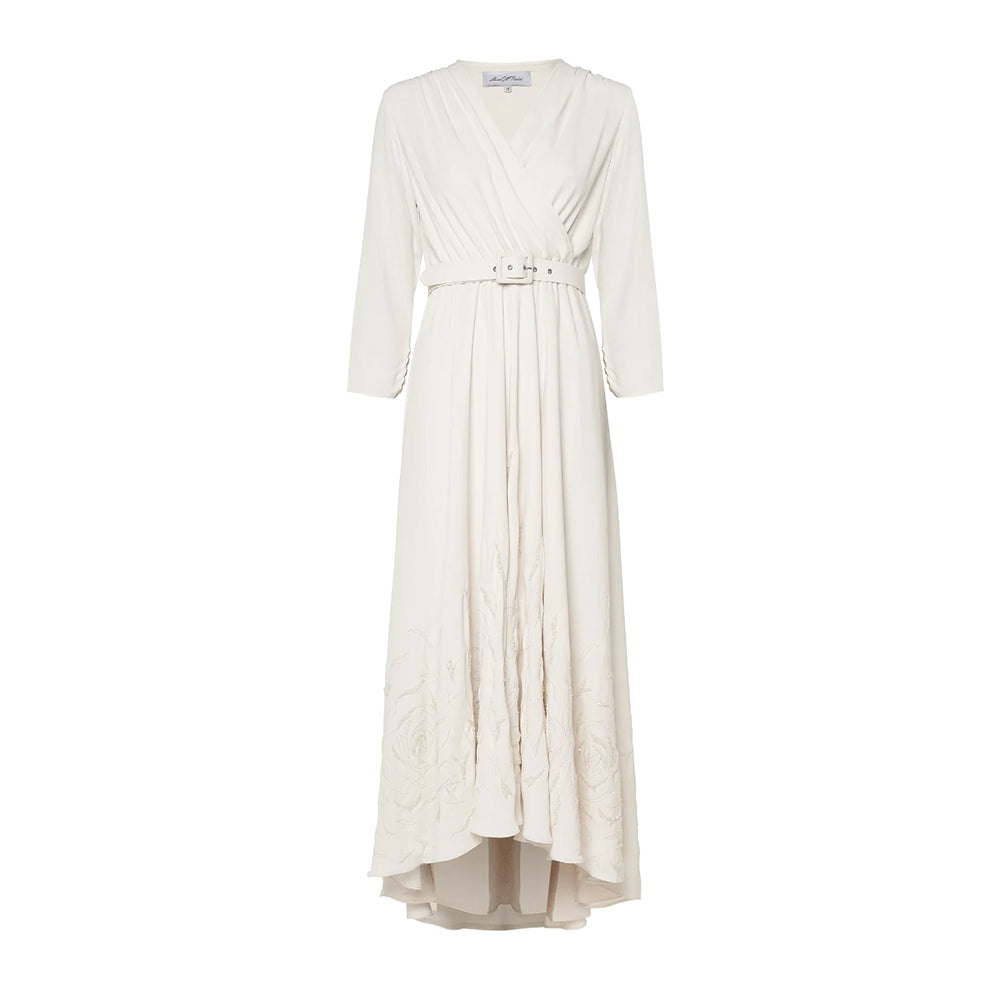 Unveil timeless elegance in this hi-lo wrap dress. Embellished with intricate embroidery and a coordinating belt.