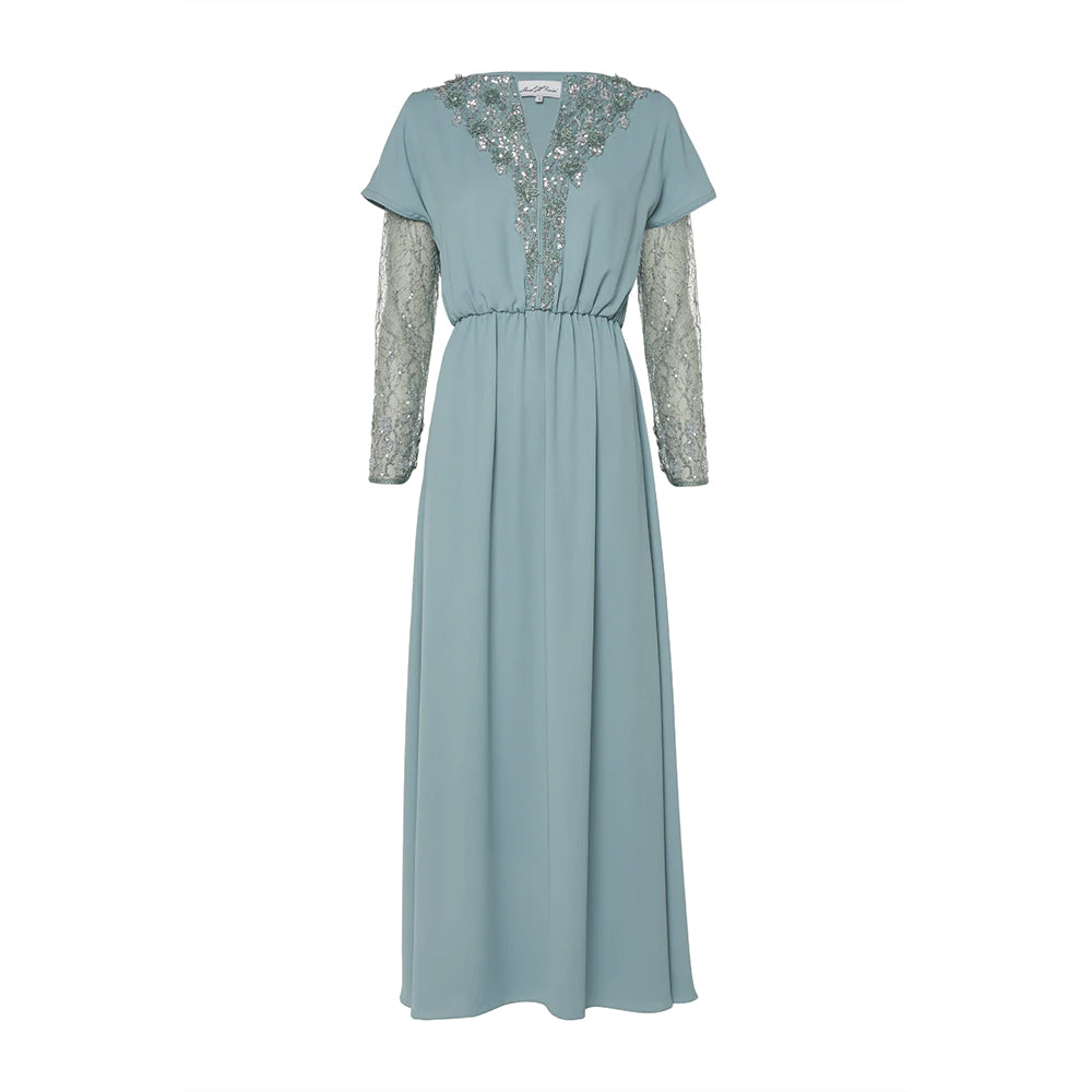 This dress features exquisite embroidered tulle sleeves and neckline, adding a touch of elegance and sophistication.