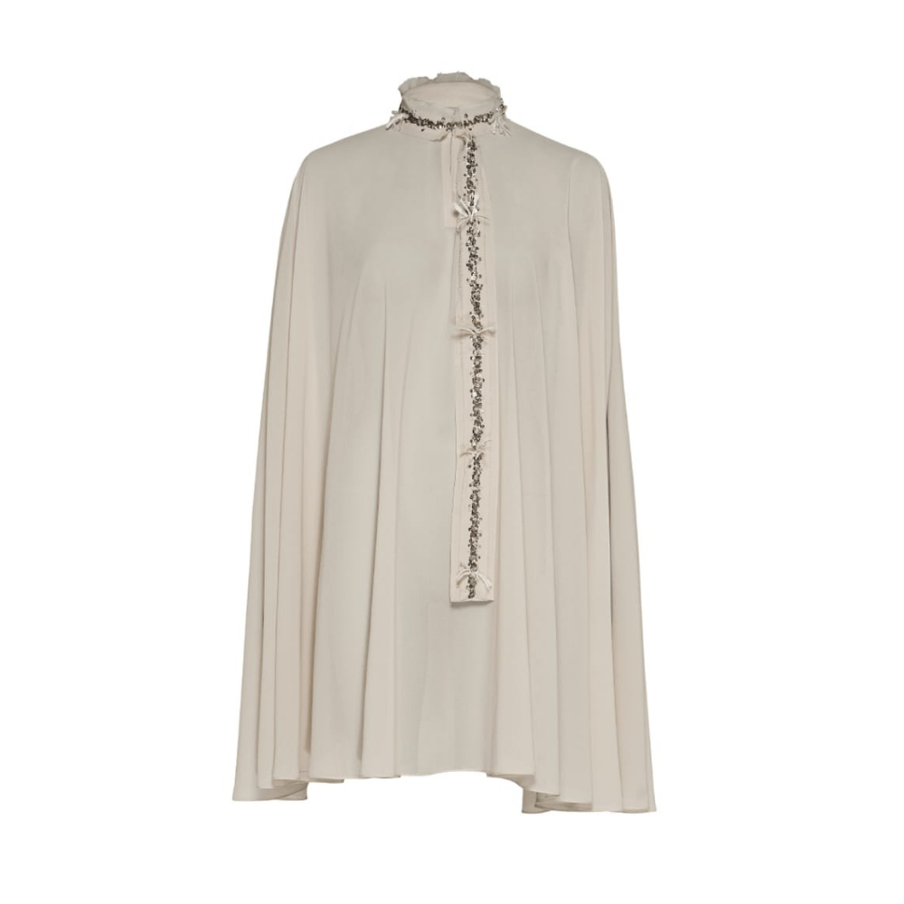 Sophisticated high neck cape, adorned with embroidered tassels. Crafted from pure chiffon, 100% polyester.