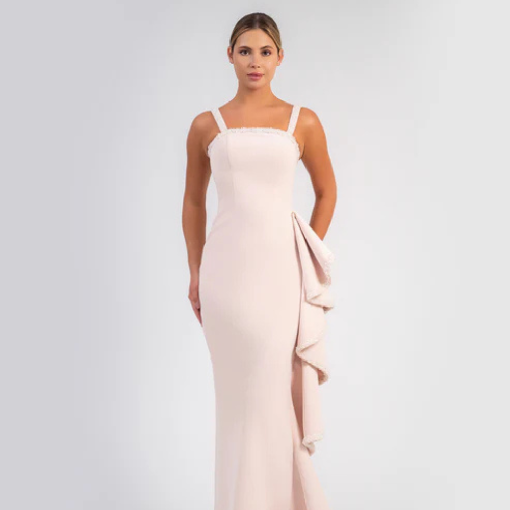 Shop online blush pink crepe gown with sleek silhouette and cascading beaded ruffle details, perfect for parties, receptions and special occasions.