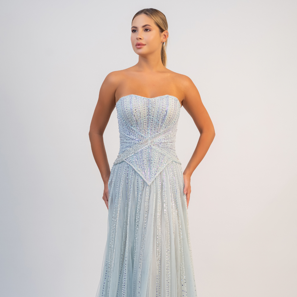 Shop online soft blue A-line gown with sculpted corset, delicate shimmer and flowing tulle elegance, perfect for parties and special occasions.