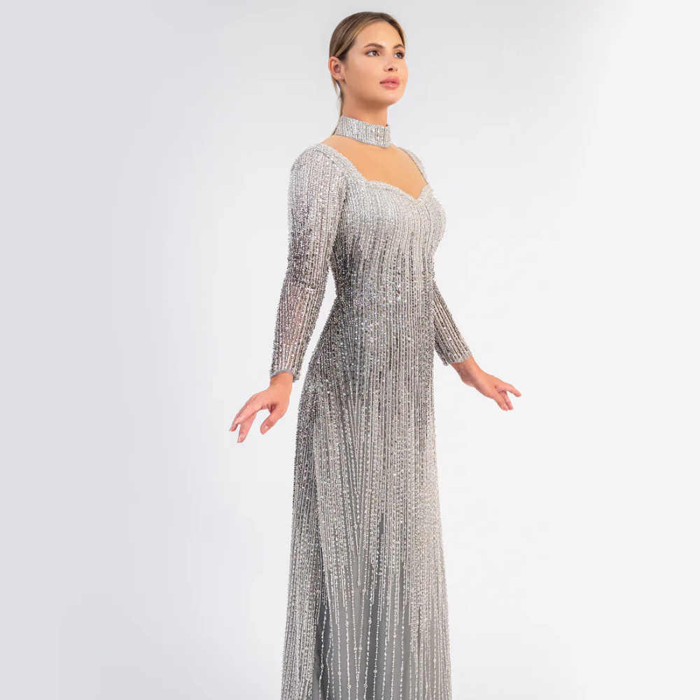 Shop online stunning ombré gown with shimmering sequins, sheer details and timeless elegance, perfect for parties and special occasions.