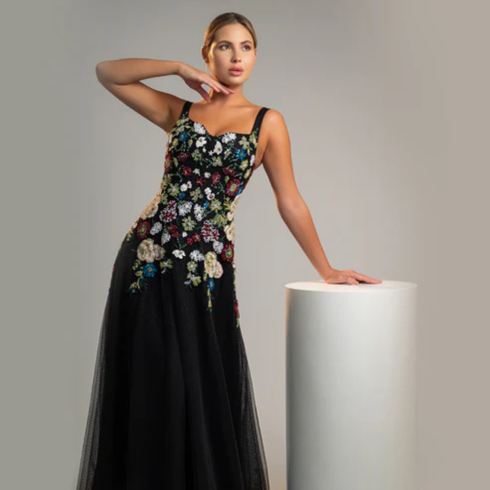 Shop online timeless black gown with blooming floral details and graceful flowing silhouette, perfect for parties, receptions and special occasions.