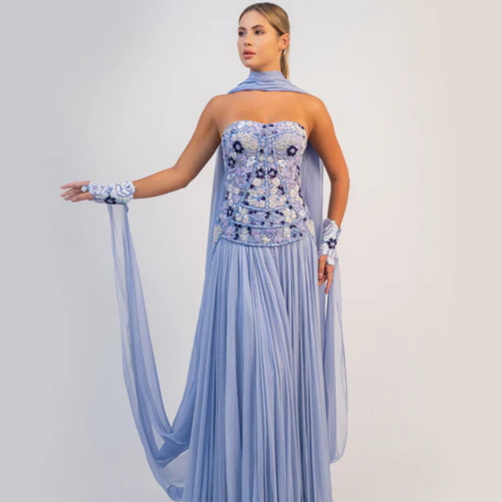 Shop online soft purple-blue gown with beaded floral corset and airy cape silhouette, perfect for parties and special occasions.