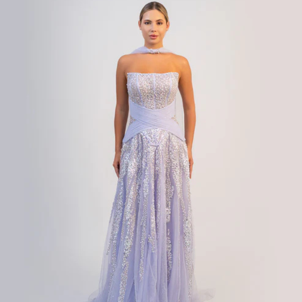 Shop online stunning lavender strapless gown with sparkling corset bodice and flowing shimmering tulle skirt, perfect for parties and special occasions.